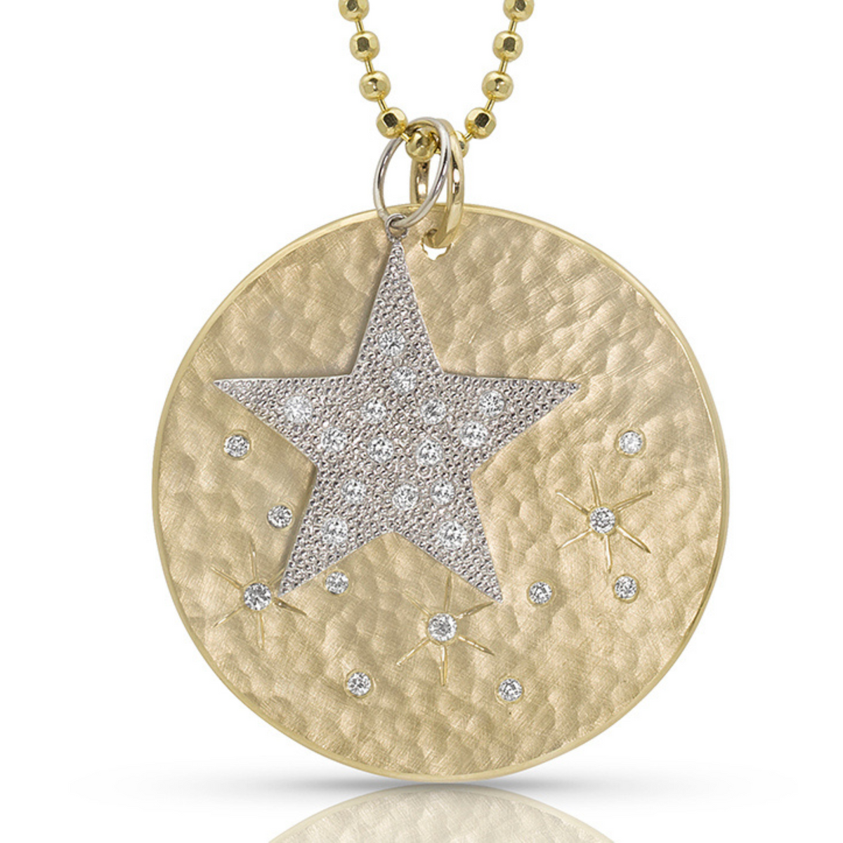 14k gold star pendant with pave set white diamonds stacked with medallion pendant on white background