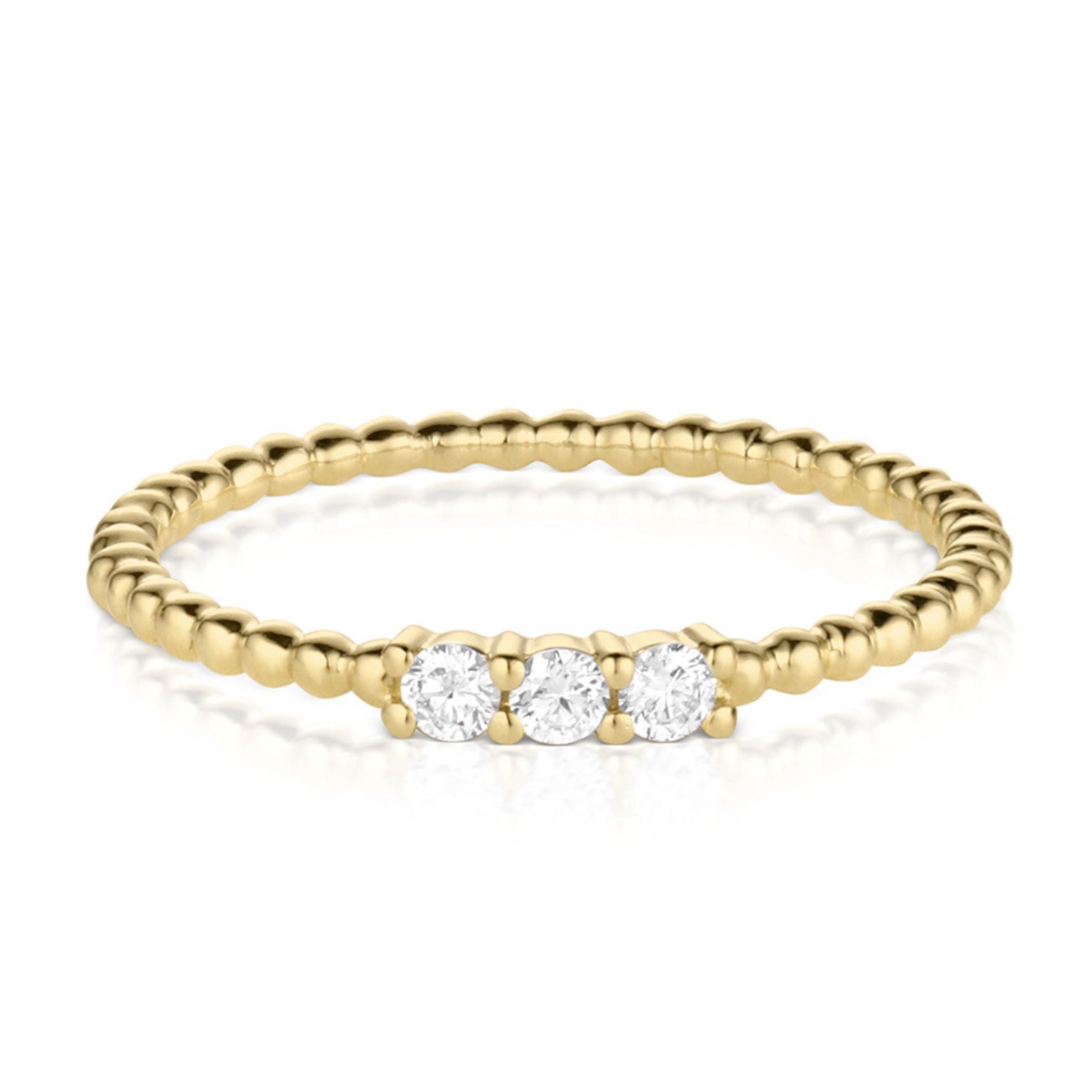 14k solid gold ring with three bezel-set diamonds, from The Lark Collection by Julez Bryant, shown on a white background