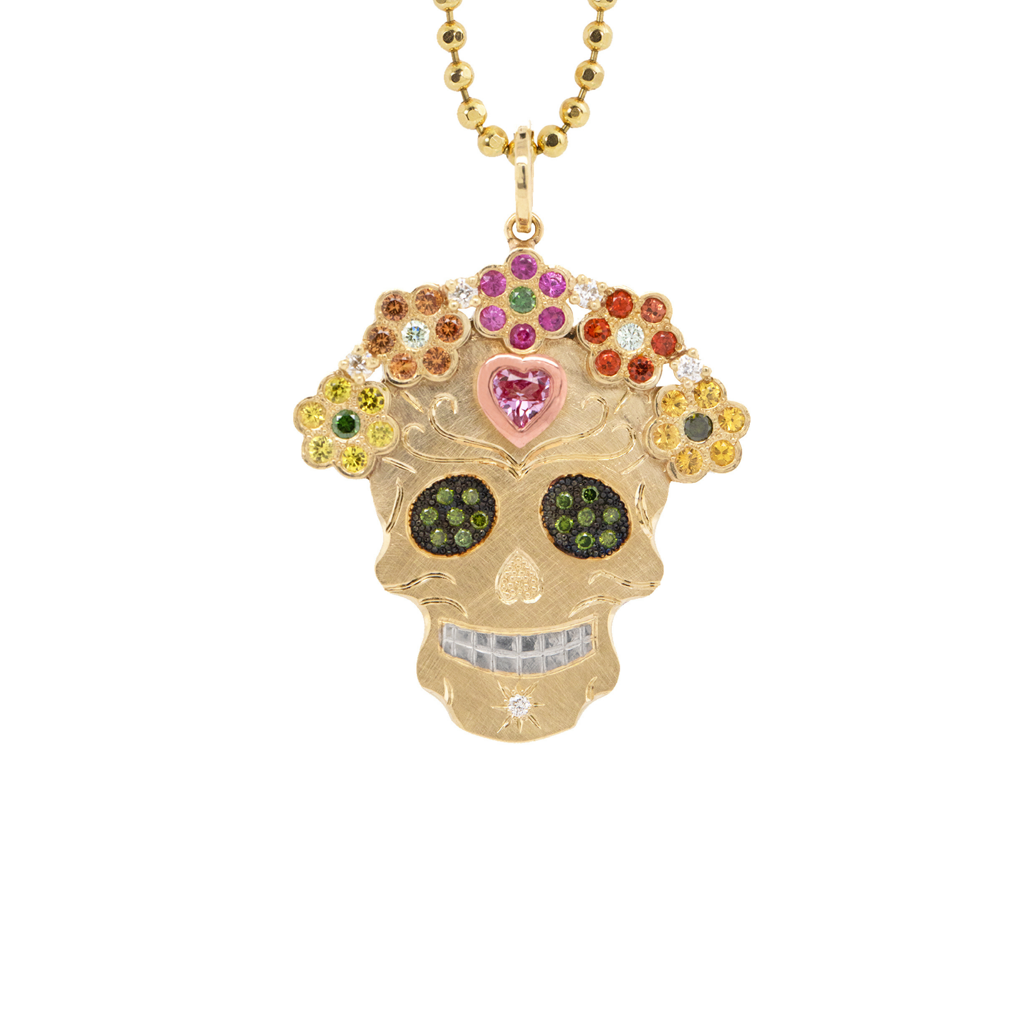 Vibrant colorful Julez Bryant original Ghostrider Collection Mi Amore gemstone encrusted sugar skull extra large pendant. 14k solid yellow gold mixed diamond sapphires and Tzavorite. Fine detail engraving highlights features. Crown of flower clustered jewels in mixed colors. Rhodium blackened eyes with green Tzavorite pave set gemstone eyes. Large pink sapphire bezel set on forehead with rose gold border. Shown on 2.0mm ball chain.