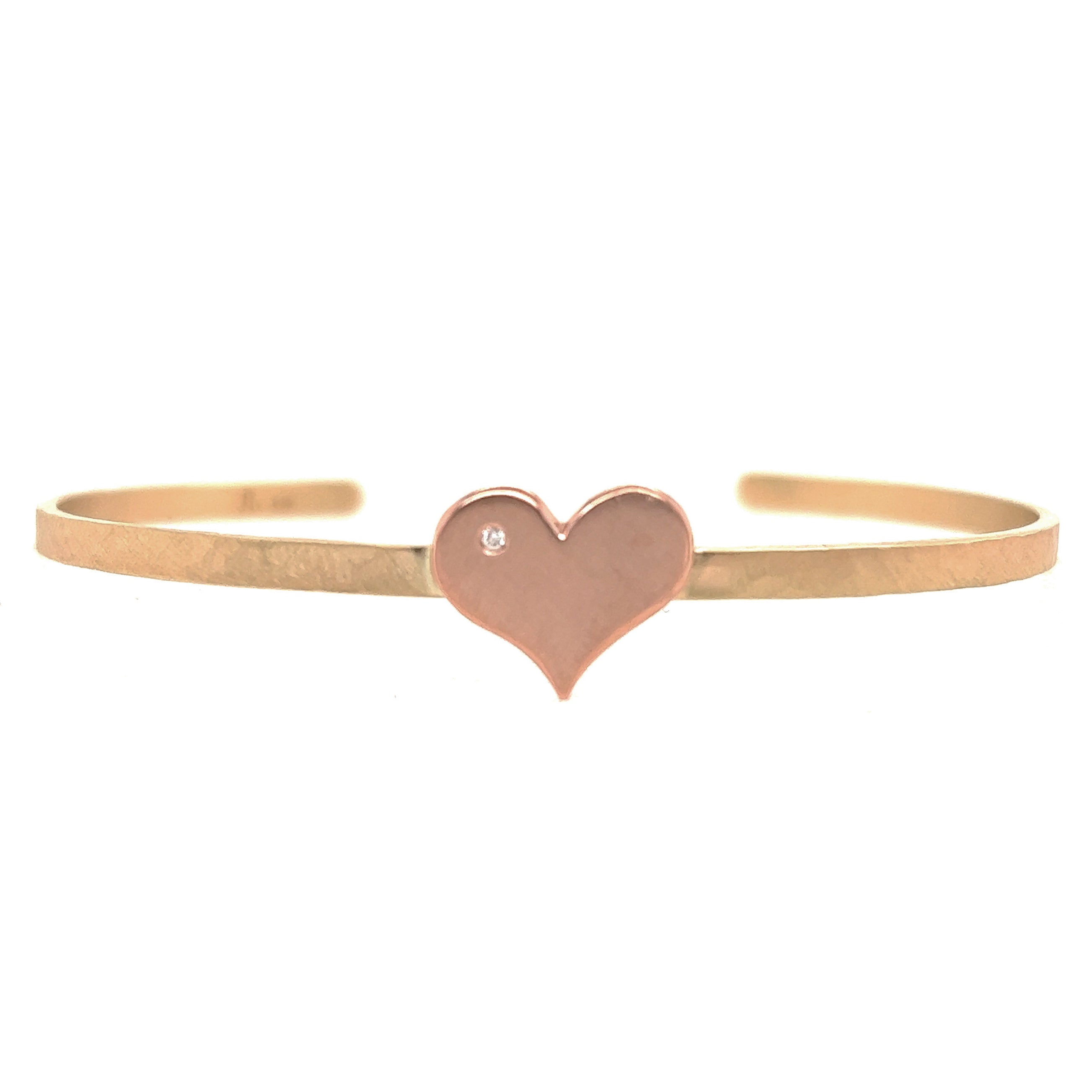 14k yellow gold hammered cuff bracelet with rose gold heart and white diamond accent on white background