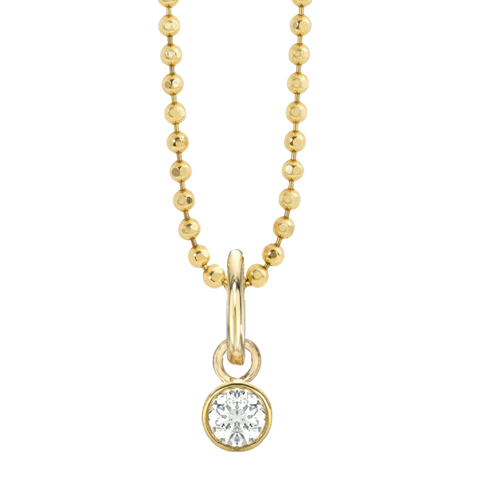 14k yellow gold bezel set white diamond charm on diamond cut ball chain on white background