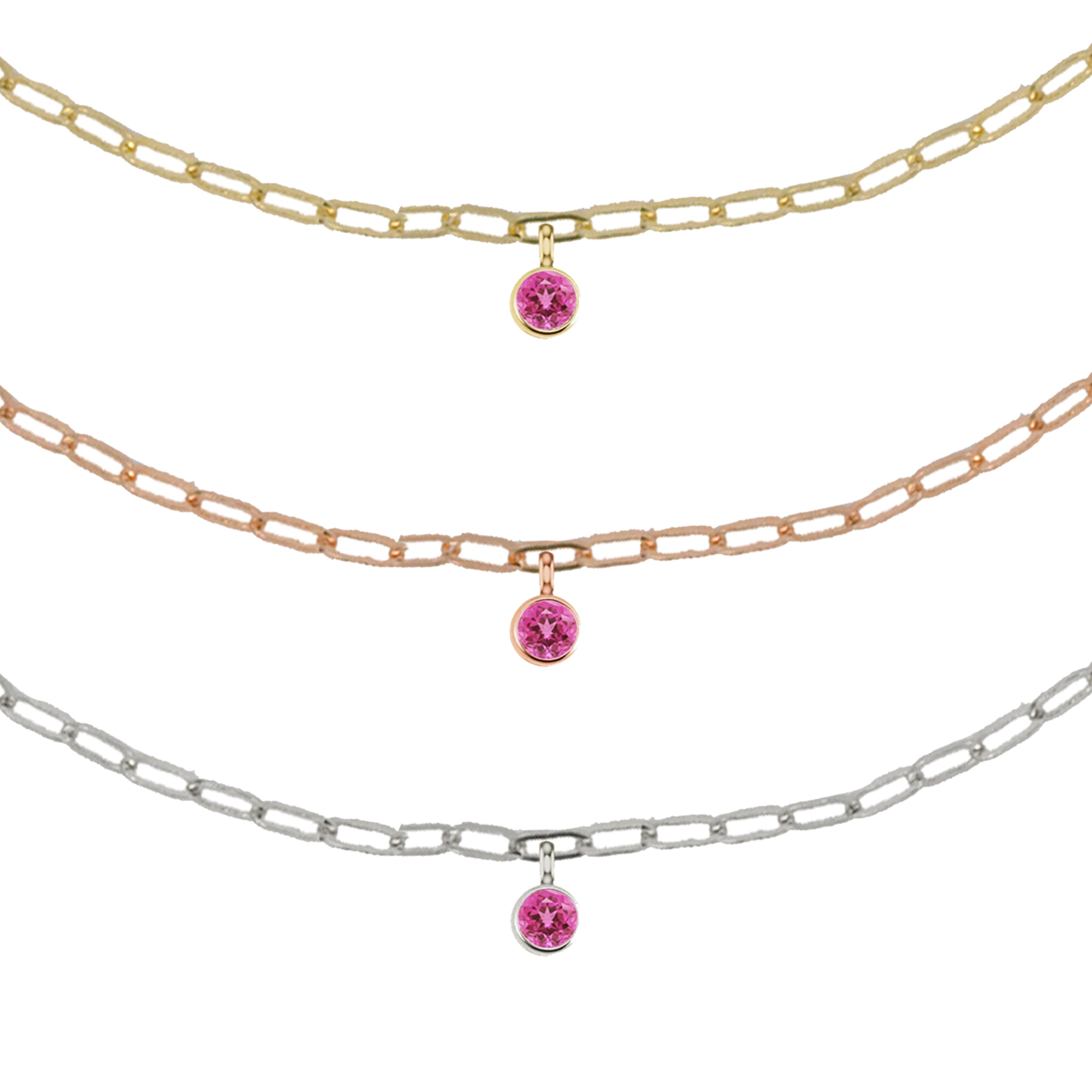 14k yellow gold and rose gold and white gold paperclip chain bracelets with bezel set gemstone charm on white background