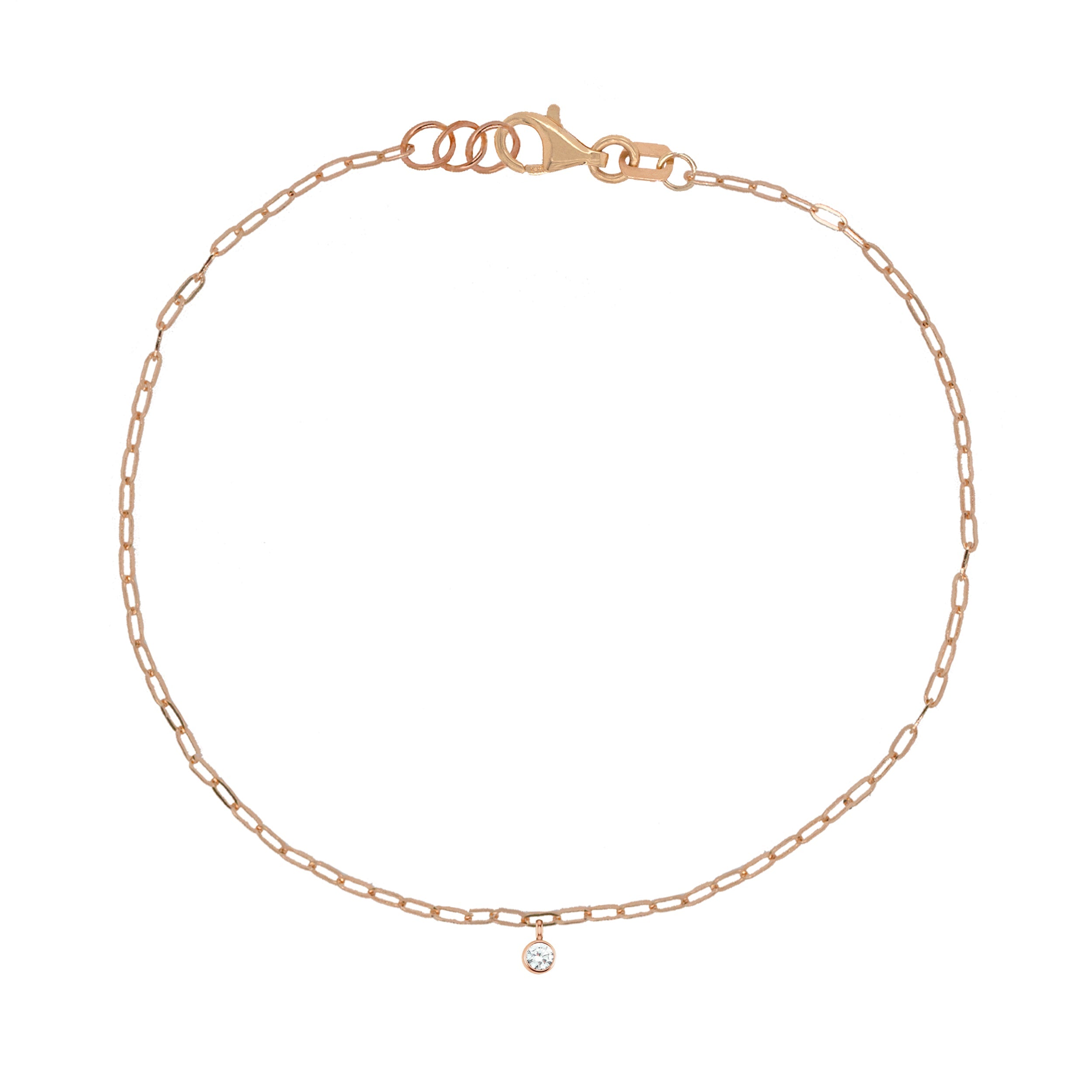 14k rose gold paperclip chain bracelet with bezel set gemstone charm on white background
