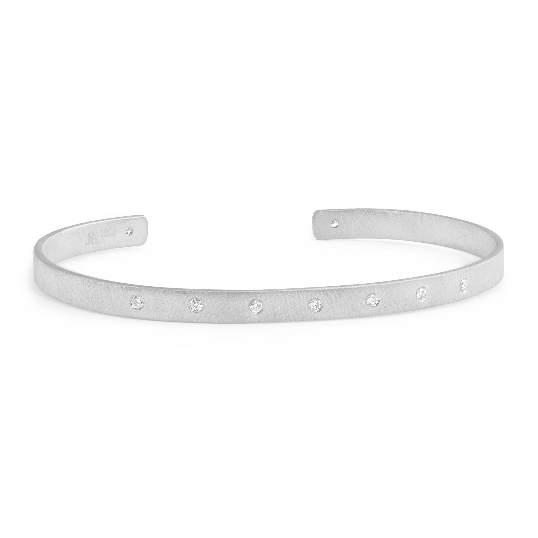 14k white gold open cuff bracelet with white diamonds on white background