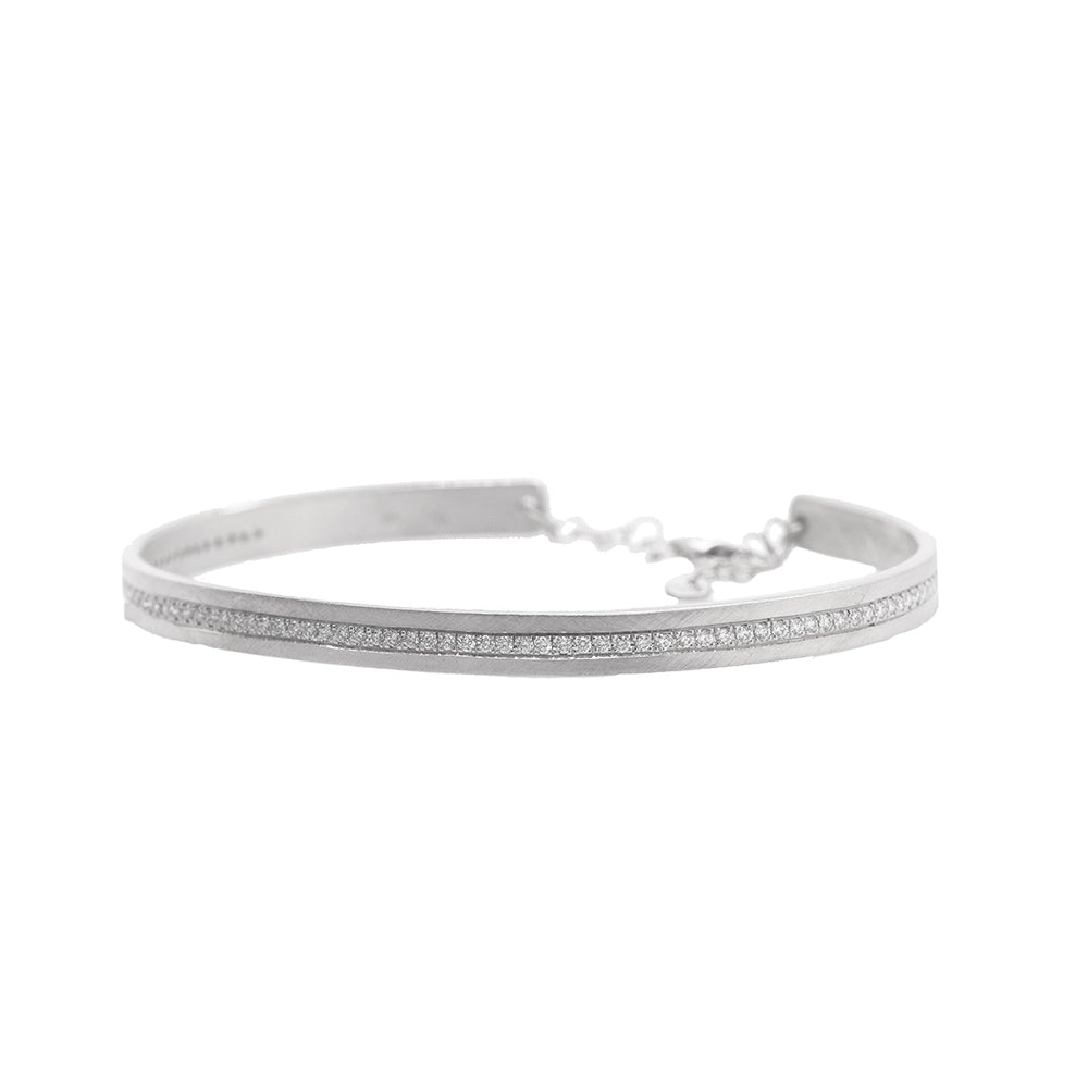 14k white gold pave set white diamond cuff bracelet with an adjustable chain on white background