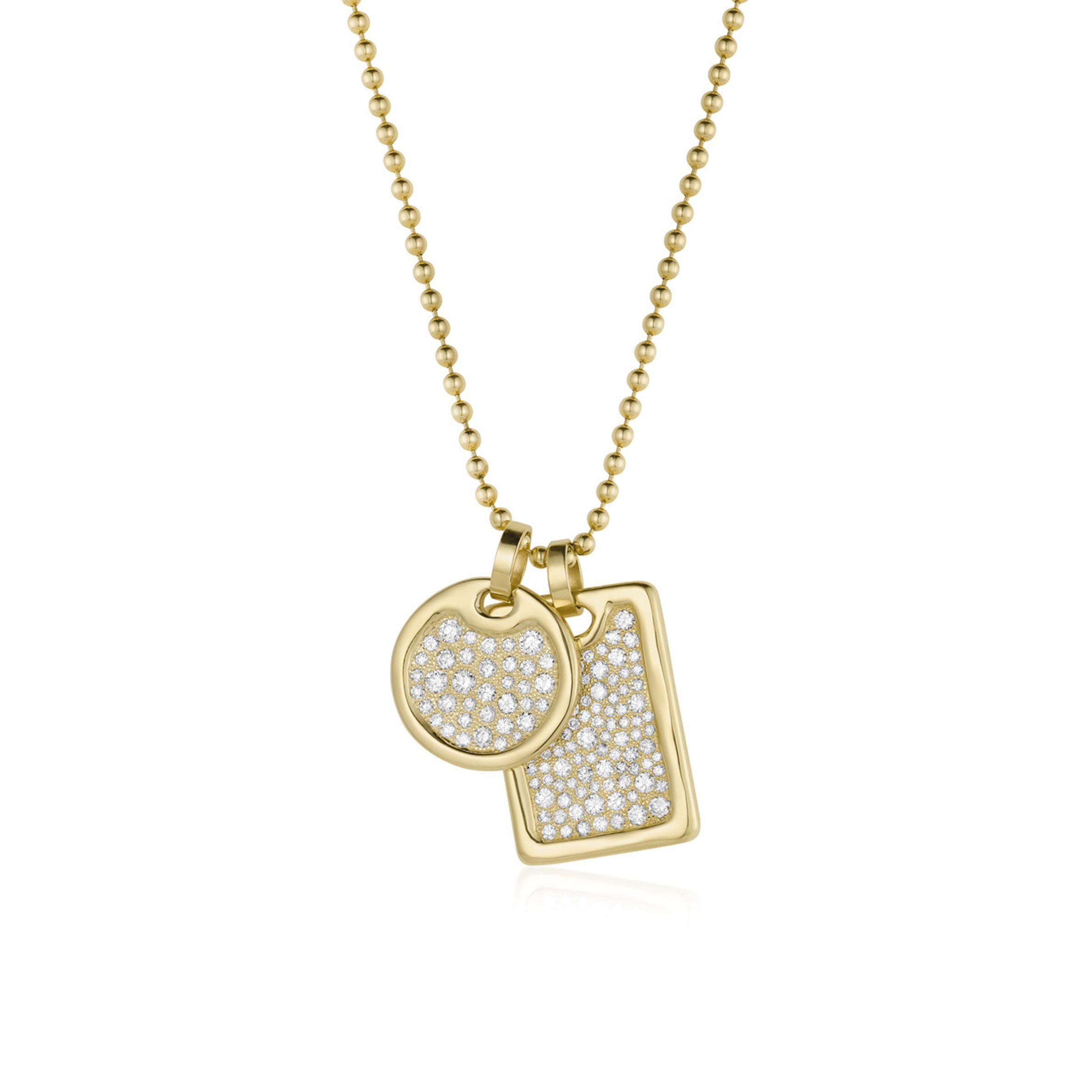 14k Gold layered dog tag pendant necklace with one round and one rectangular pendants on a white background