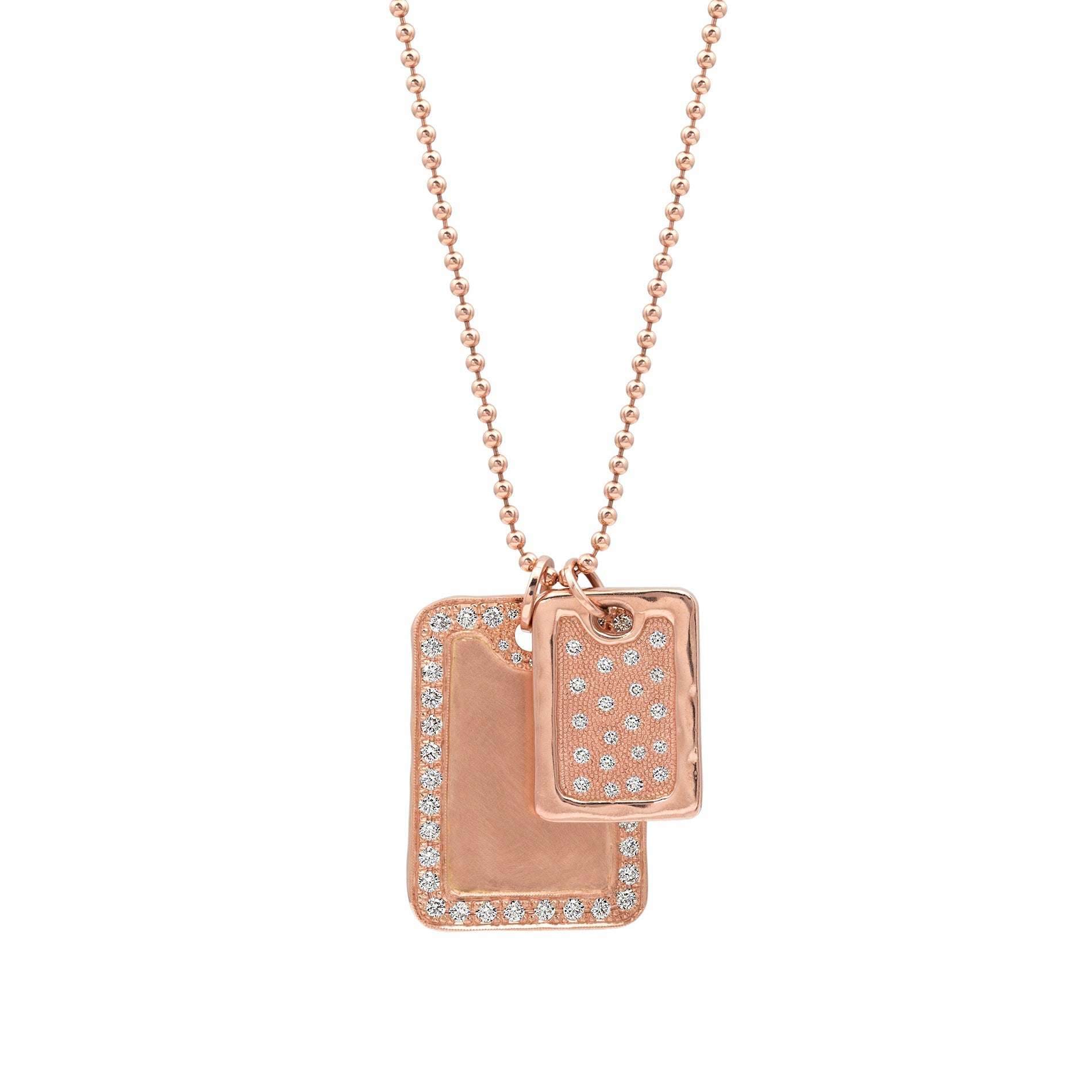 Pair of large and medium 14k rose gold rectangular dog tag pendant featuring pave diamond halo satin finish interior perfect for engraving shown hanging from ball chain on white background