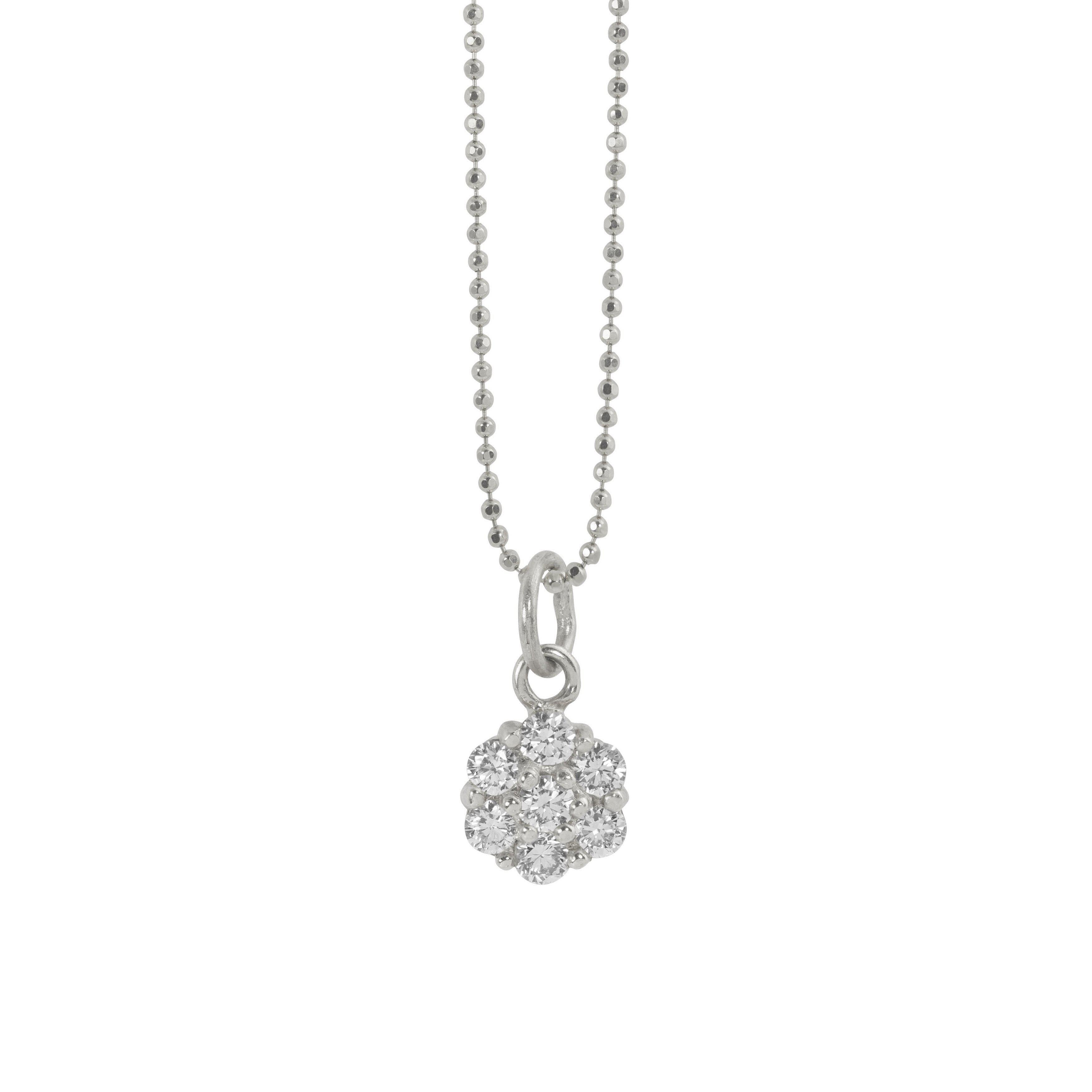 14k white gold white diamond cluster pendant on a diamond cut ball chain on a white background