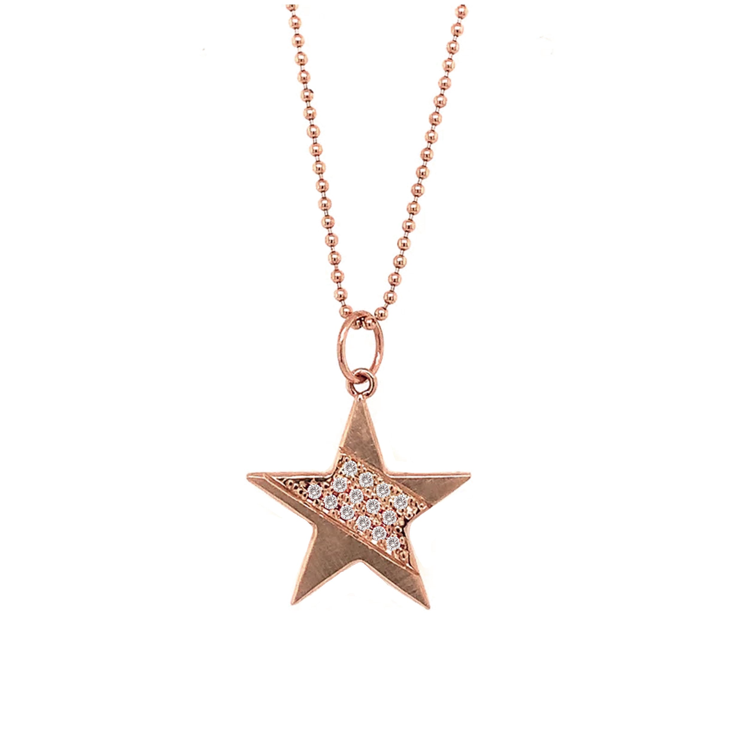 14k rose gold star-shaped pendant with paved set white diamonds on a ball chain on a white background