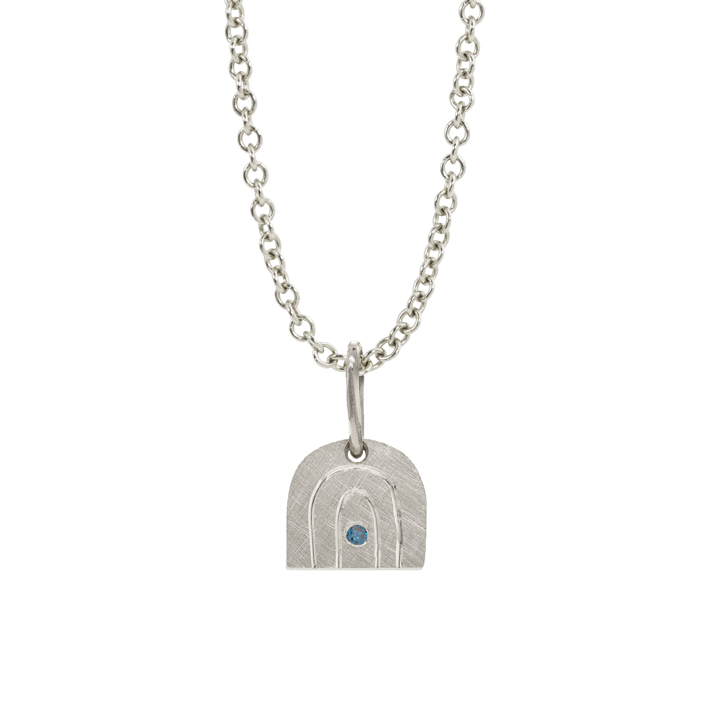 14k white gold rainbow pendant with a colored gemstone in the center on a rolo chain on a white background