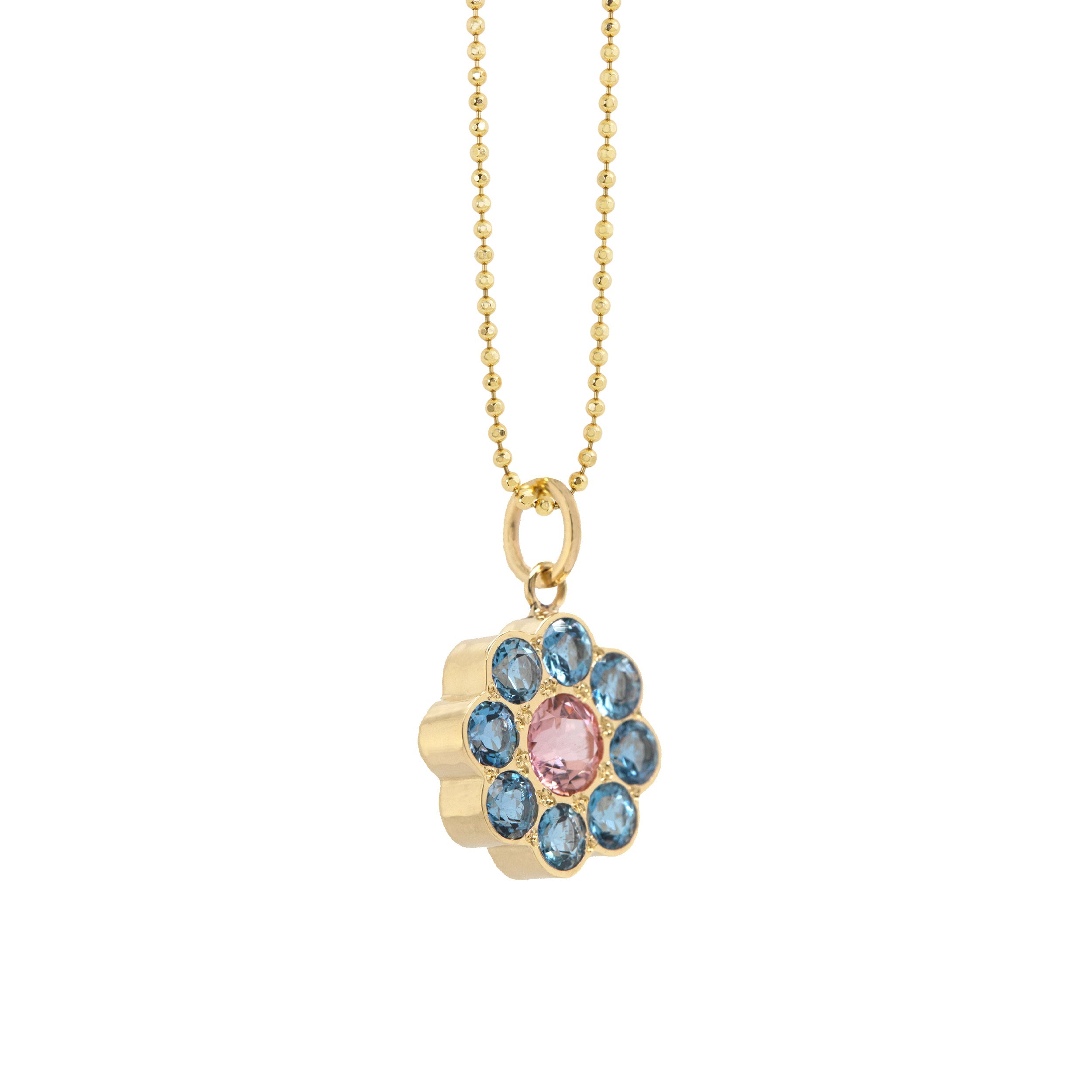 14k yellow gold flower pendant featuring blue and pink gemstones on a diamond cut ball chain on a white background