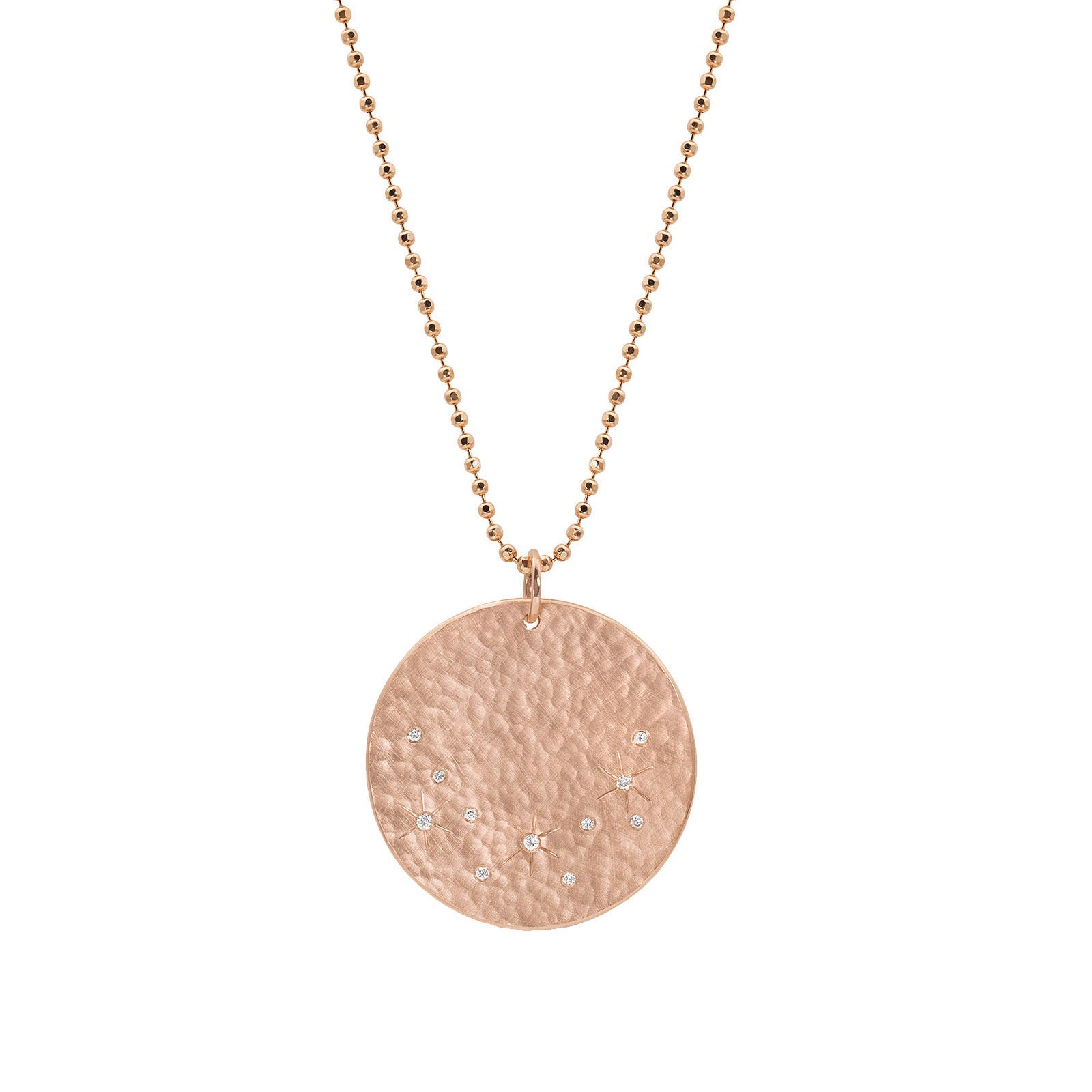 14k rose gold round medallion with hammered finish and scattered white diamonds with hand etched starbursts on diamond cut ball chain on white background