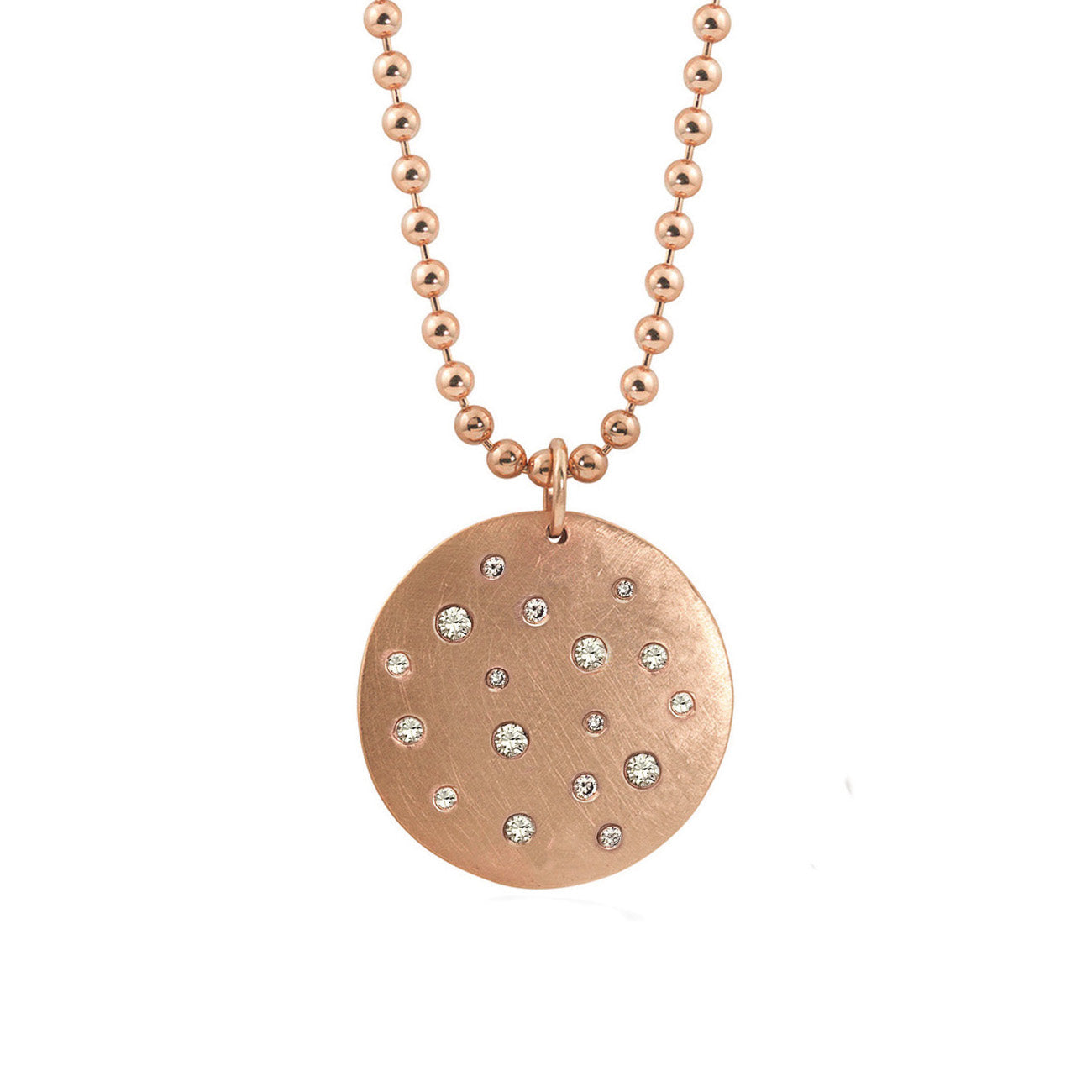 14k rose gold round pendant featuring scattered white diamonds on a ball chain on a white background