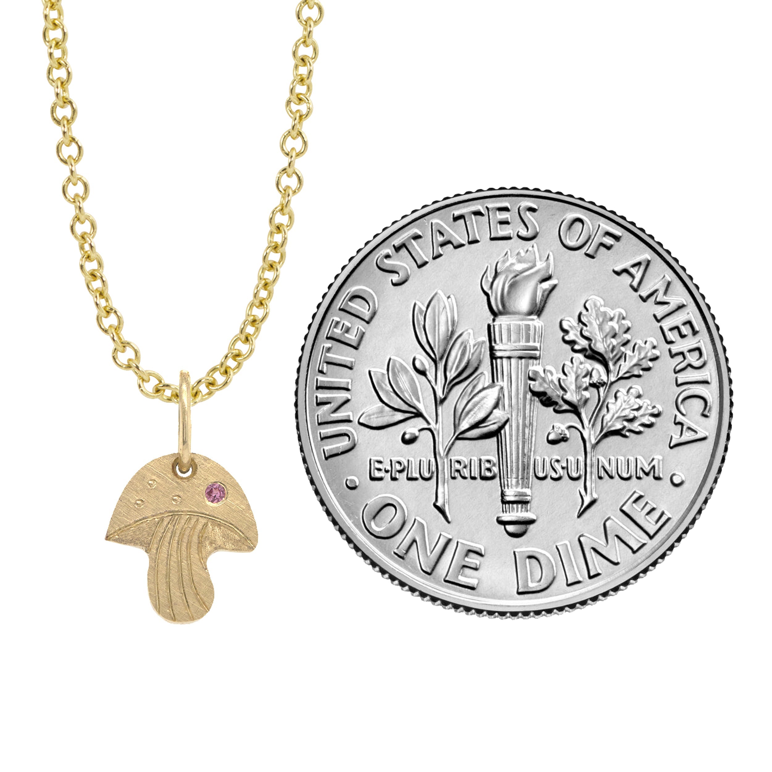 14k yellow gold mushroom pendant with pink sapphire and hand etching on a rolo chain on a white background with size indicator