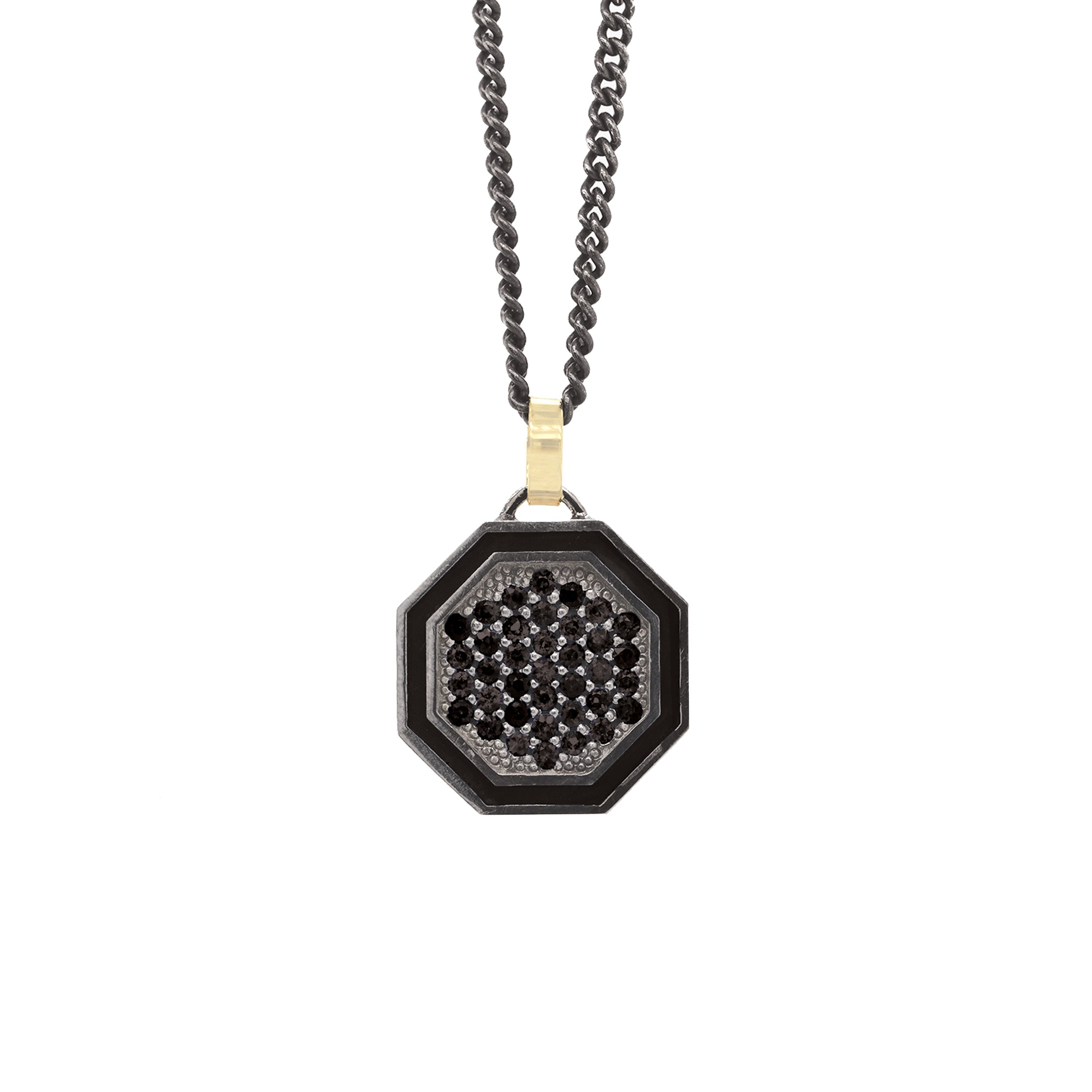 blackened sterling silver octagon pendant with colored gemstones and colored enamel border on 14k yellow gold jump ring on white background