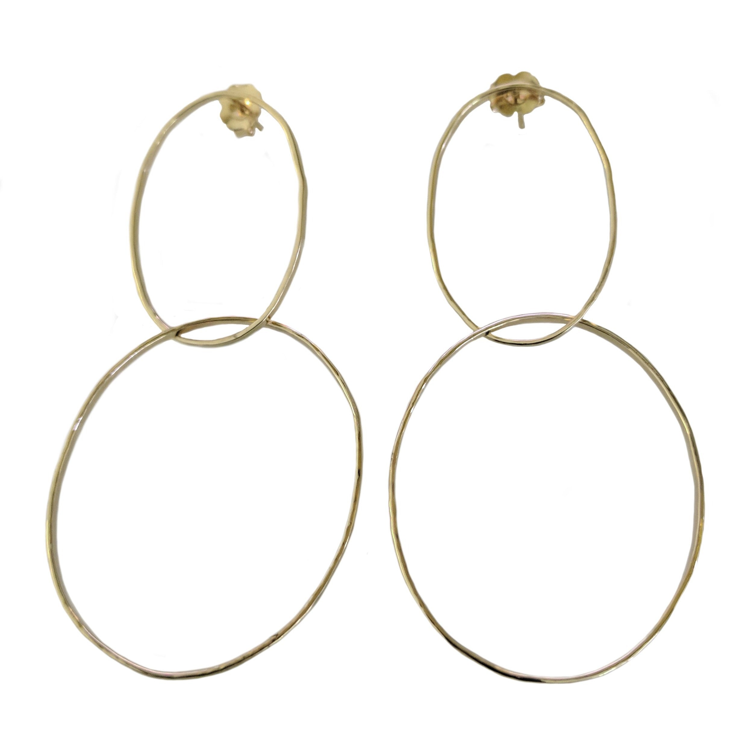 14k yellow gold double intersecting hoop earrings with posts shown on white background