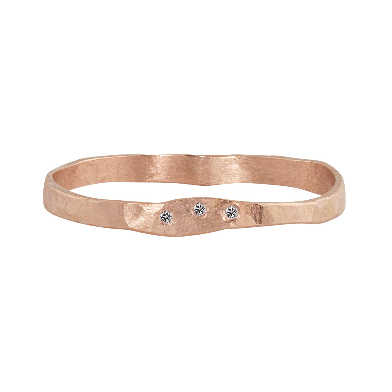 14k rose gold hammered stackable ring with three white diamonds on a white background
