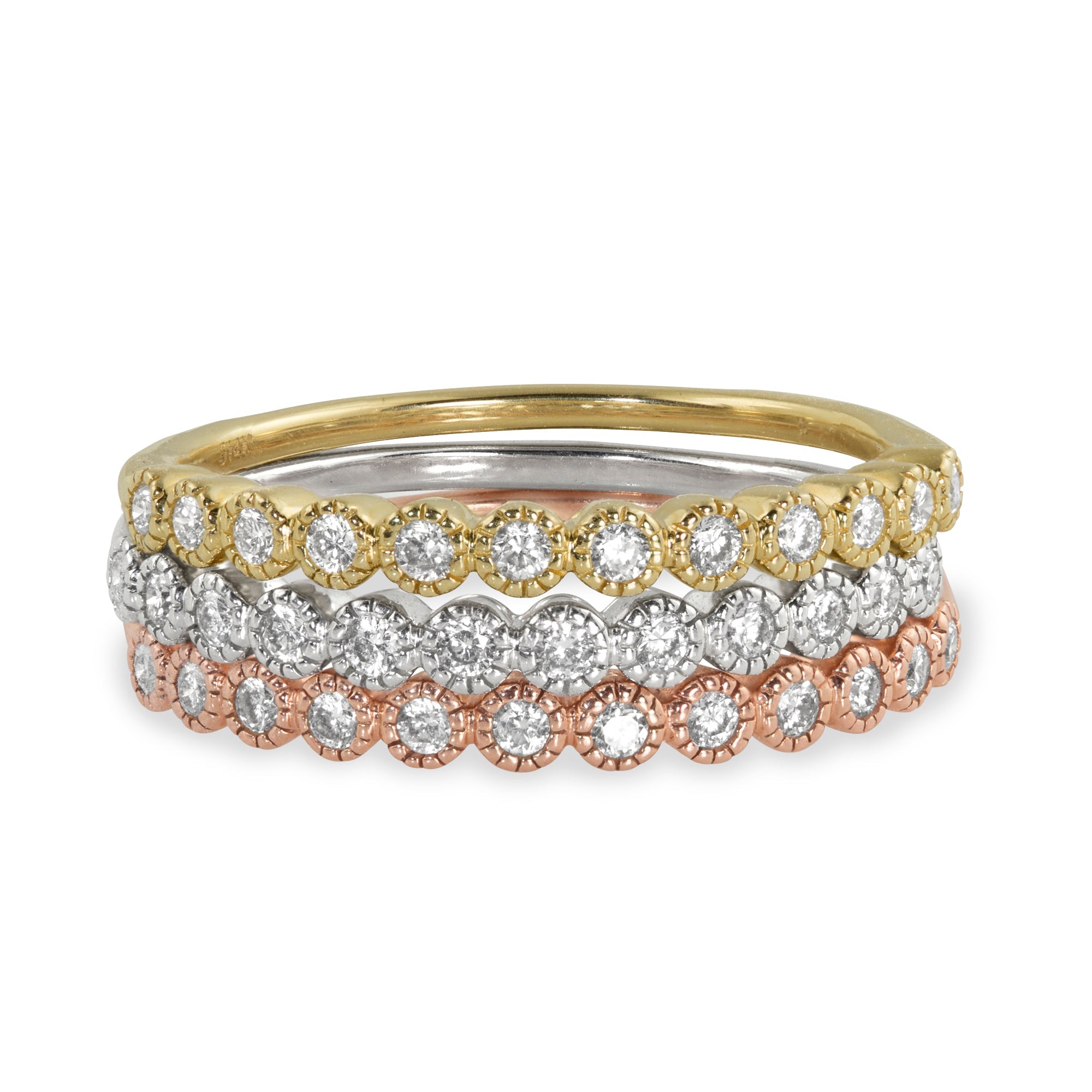 14k yellow gold half eternity ring with milgrain set white diamonds stacked with the white gold and rose gold matching rings on white background