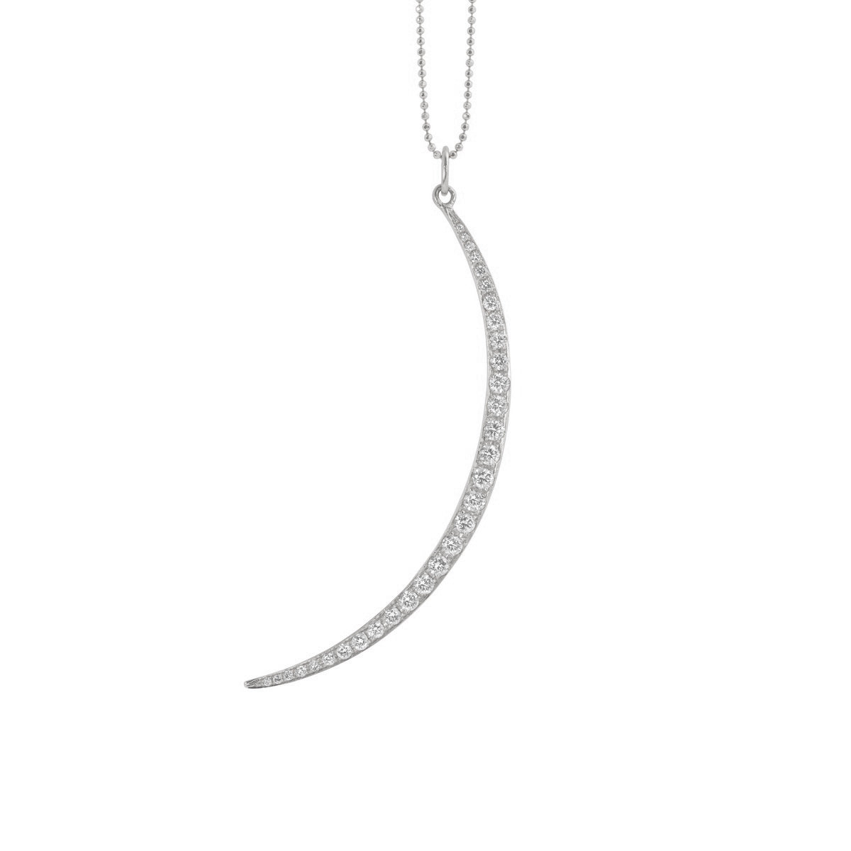 14k white gold curved crescent moon pendant with paved set white diamonds on a white background