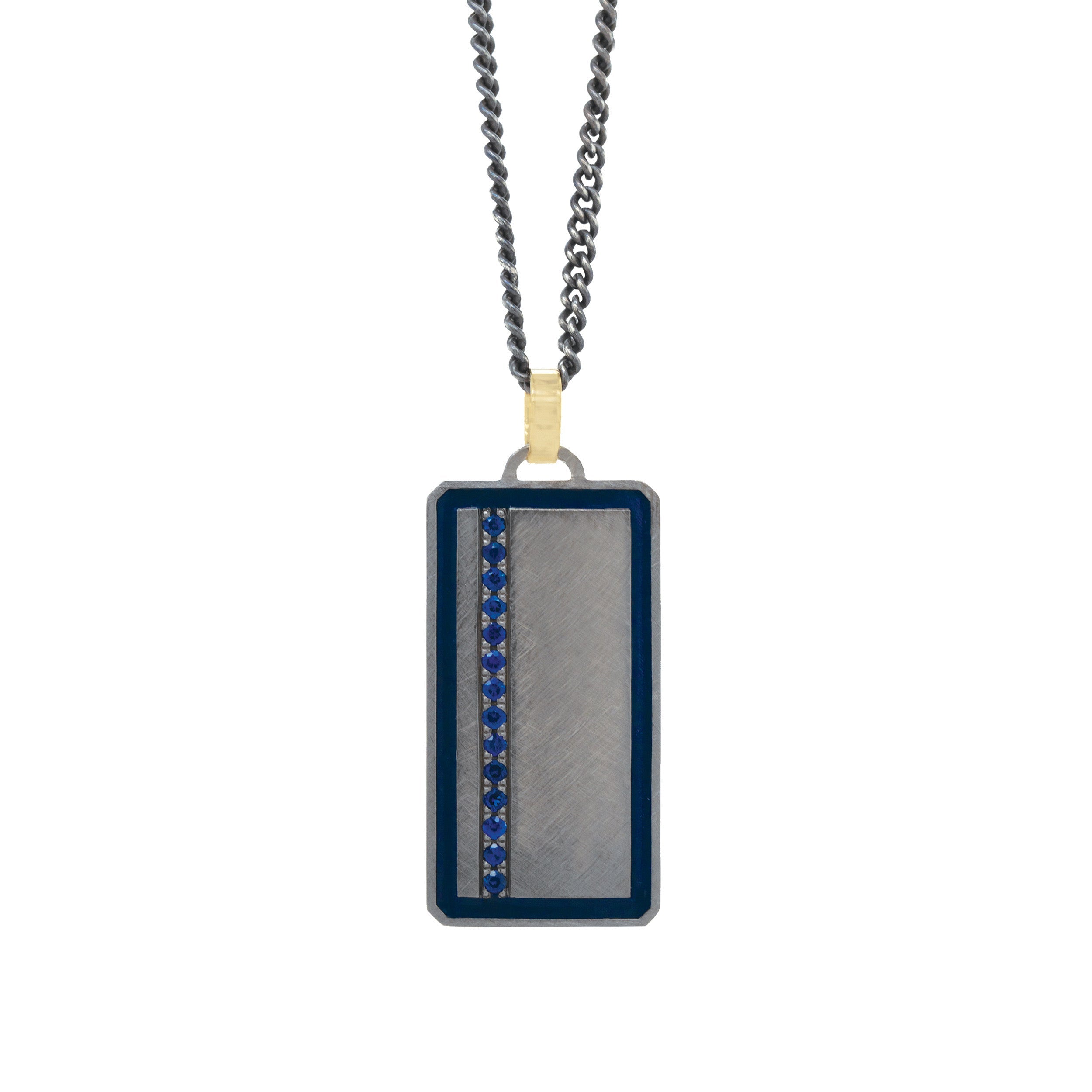blackened sterling silver rectangular pendant with colored enamel border and colored gemstone line with 14k yellow gold jump ring on white background