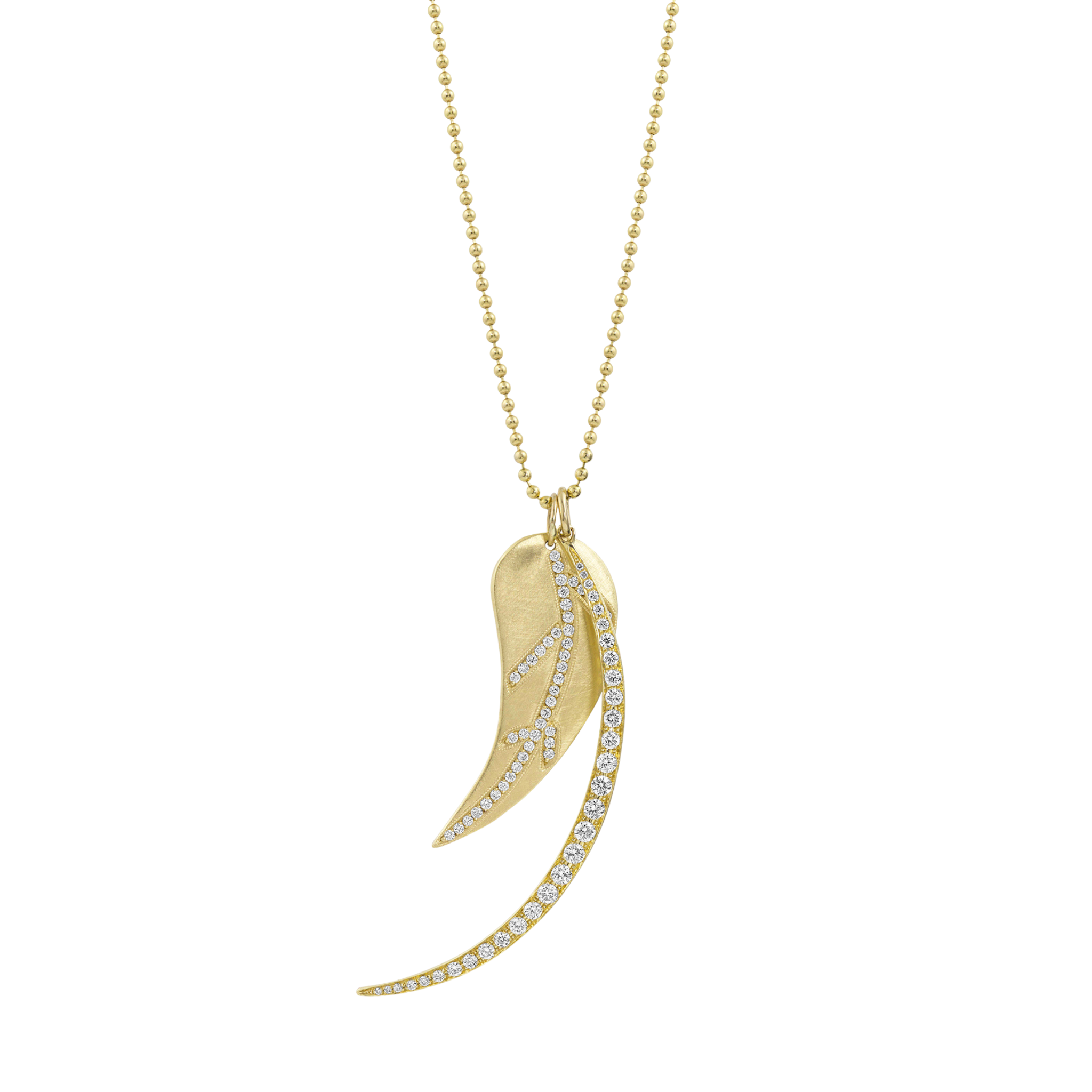 Rose gold necklace with a leaf-shaped cutout pendant paired with crescent moon with pave white diamonds on a white background