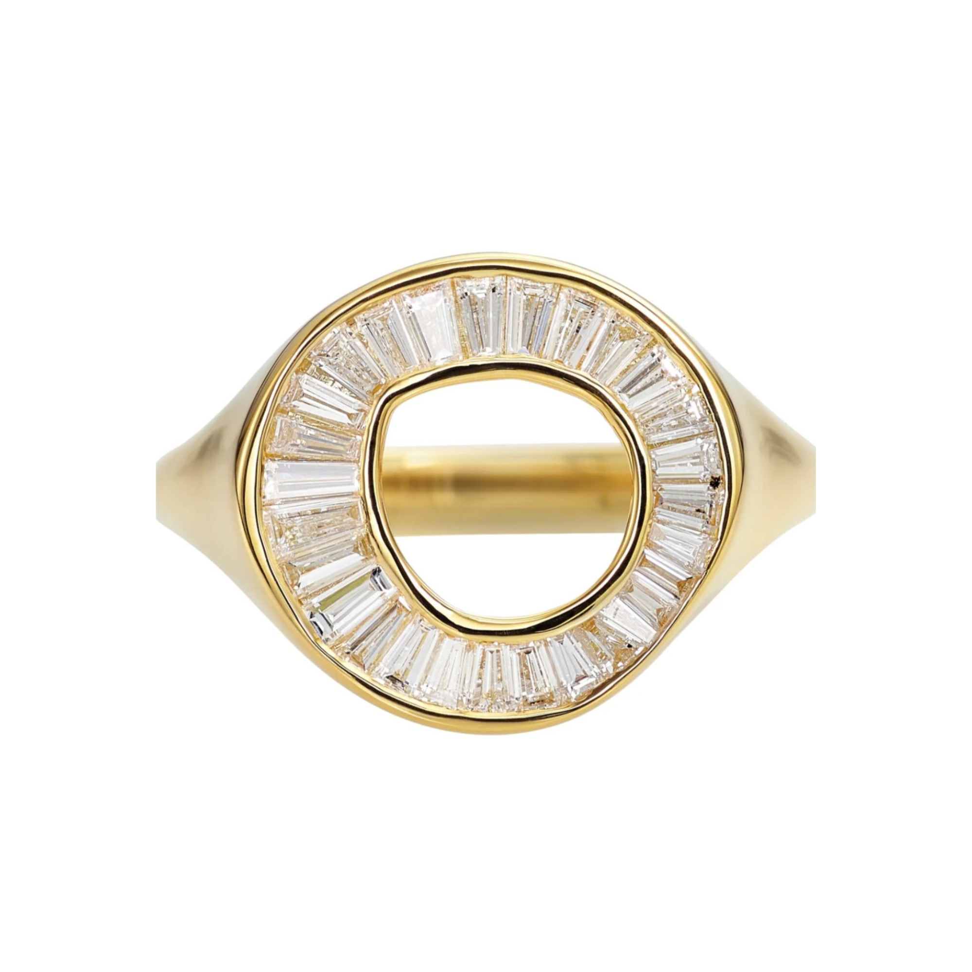18k yellow gold ring features tapered baguettes set into an organic open circle ring on white background