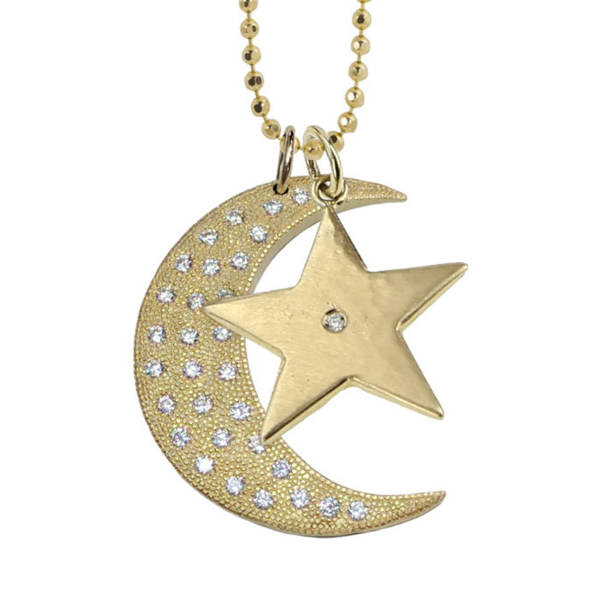 14k yellow gold satin star pendant charm with center white diamond accent with yellow gold beaded moon pendant with white diamonds on diamond cut ball chain on white background