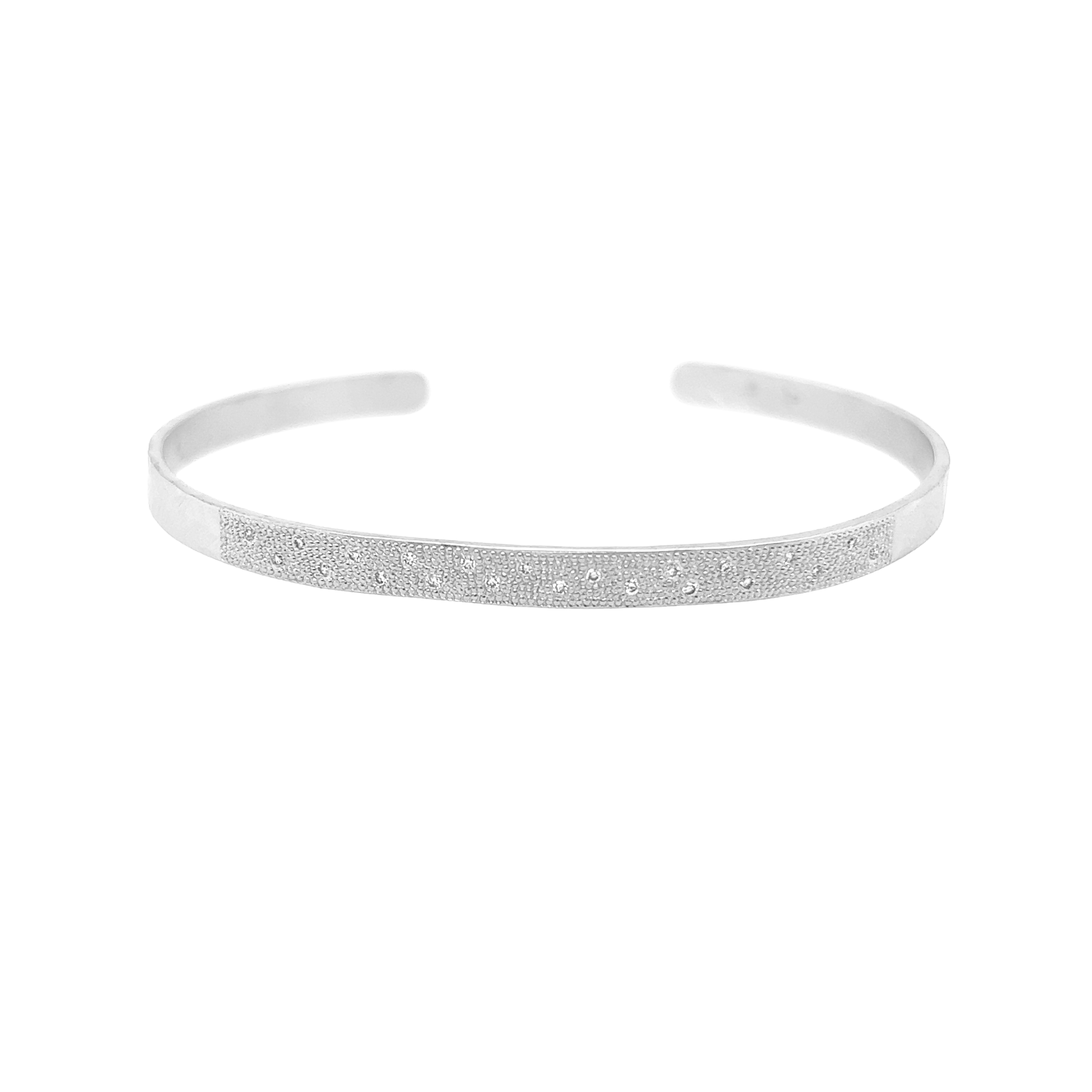 14k white gold hammered cuff bracelet with beaded texture and scattered white diamonds on white background