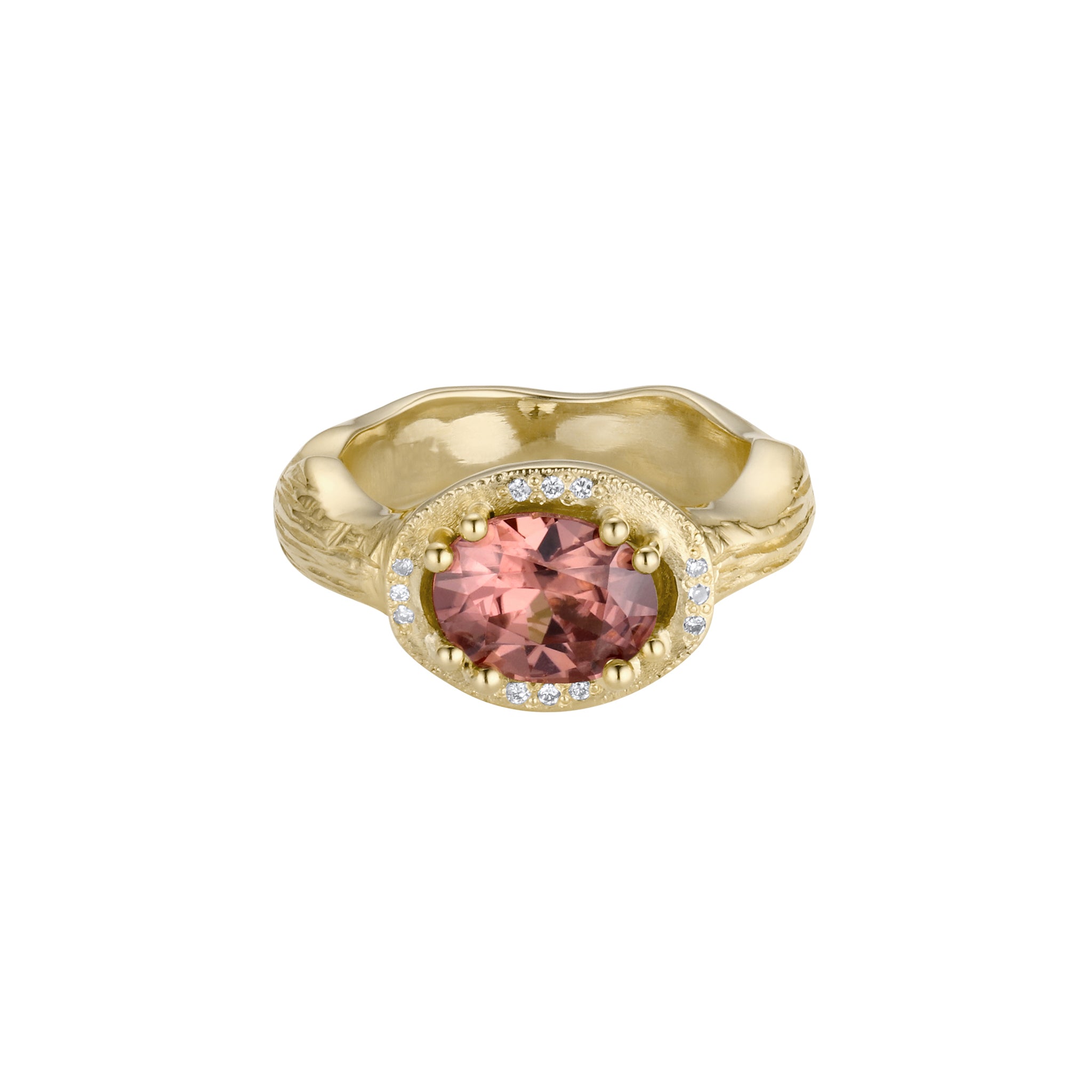 18k Yellow Gold Cocktail Ring ring with a pink Zircon gemstone. Featuring an organic wavy band with texture on a white background