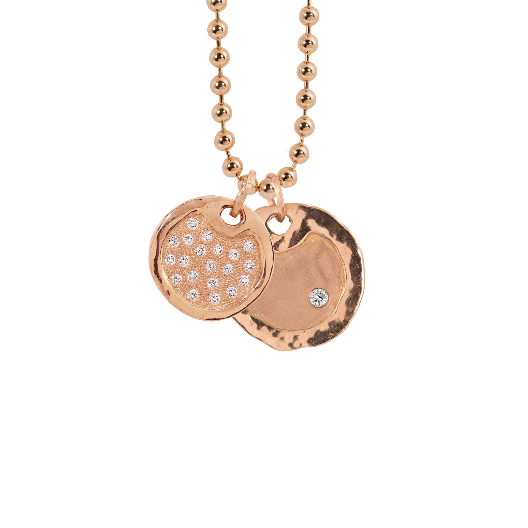 14k rose gold round double dog tag necklace pendants featuring white diamonds raised hammered polished border on a ball chain with white background