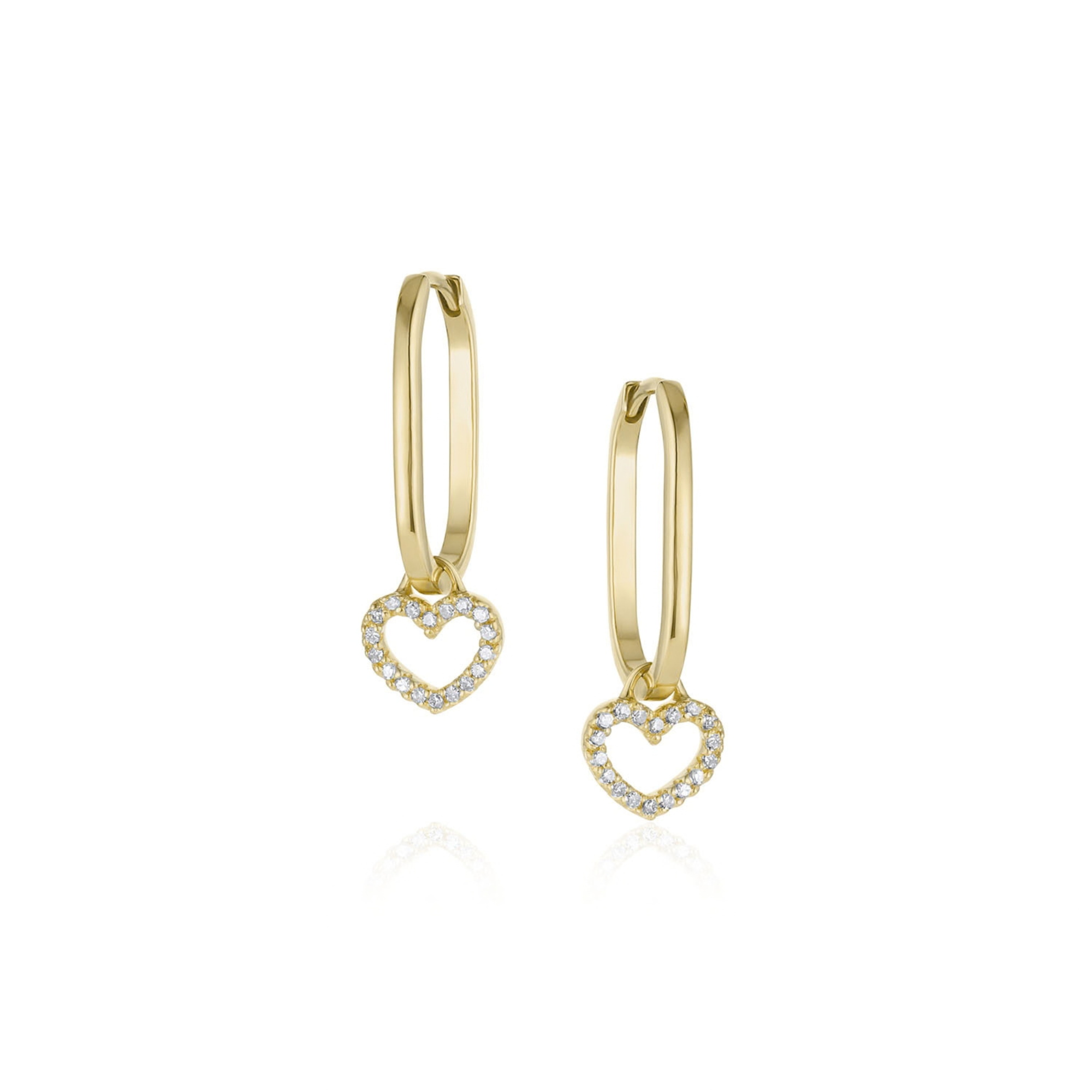 14k yellow gold hinged oval hoop earrings with pave set white diamond heart charms on white background