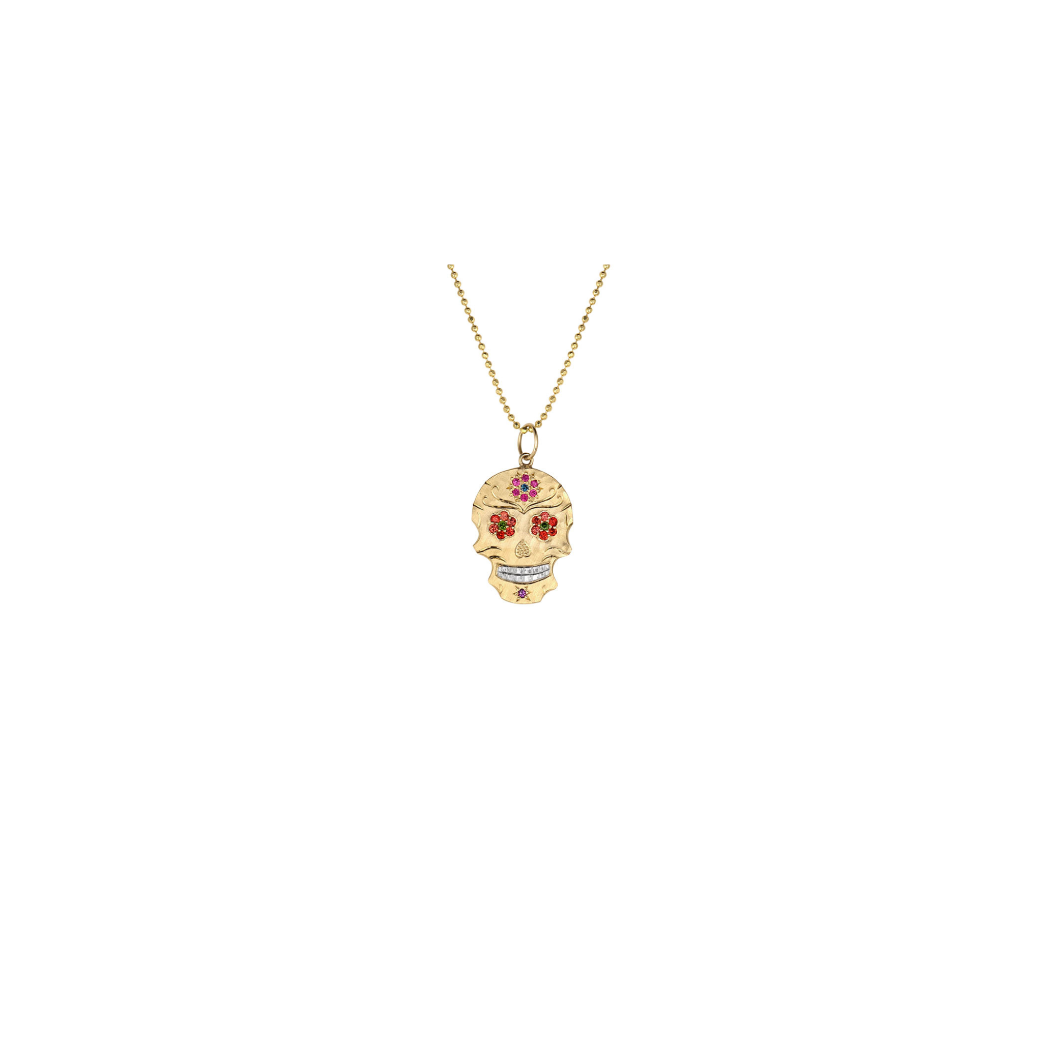 Gold skull shaped pendant necklace with colorful gemstone floral eyes on a white background.Featured on 14k gold ball chain.