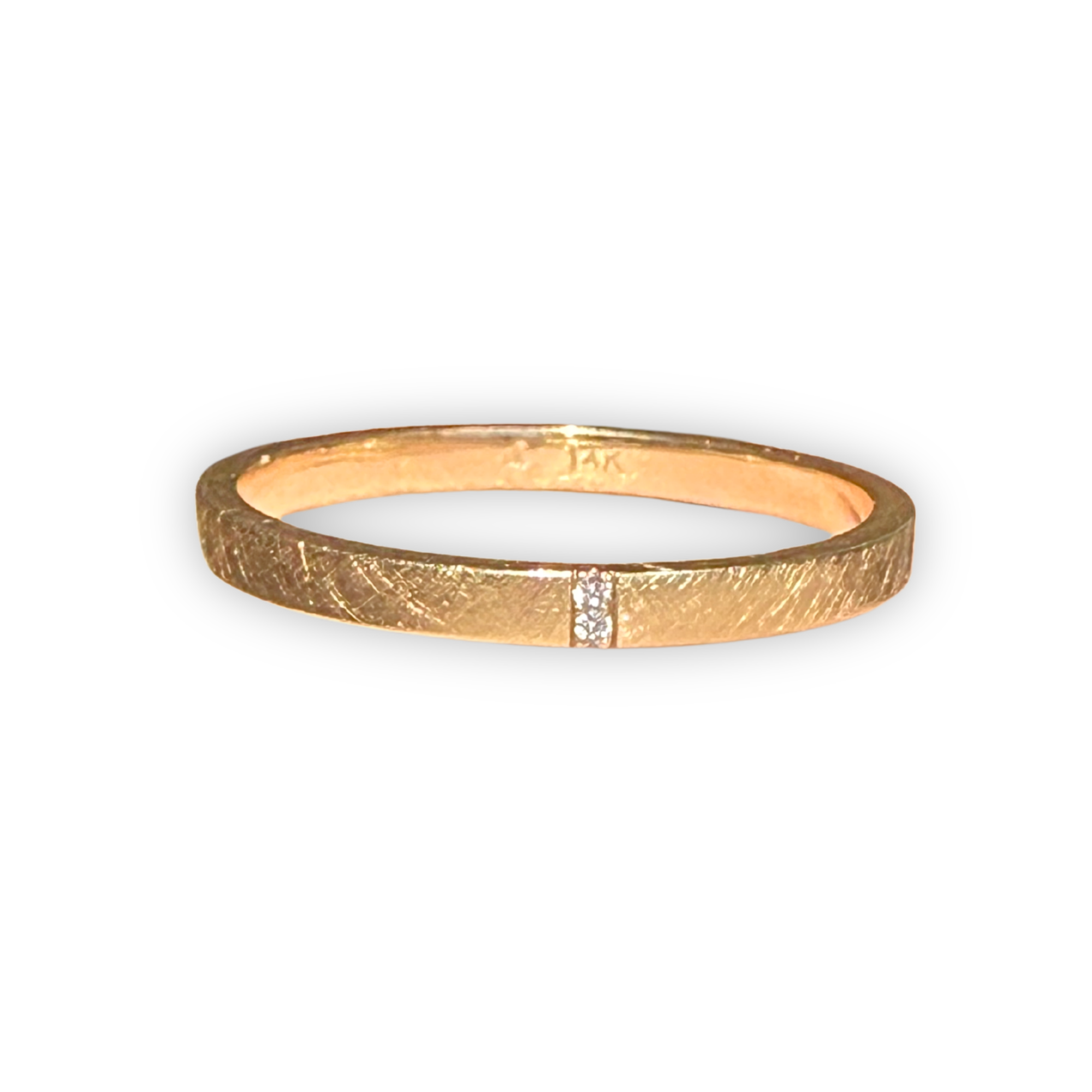 14k yellow gold stacker ring featuring two white diamonds set side by side in a satin finished band on a white background