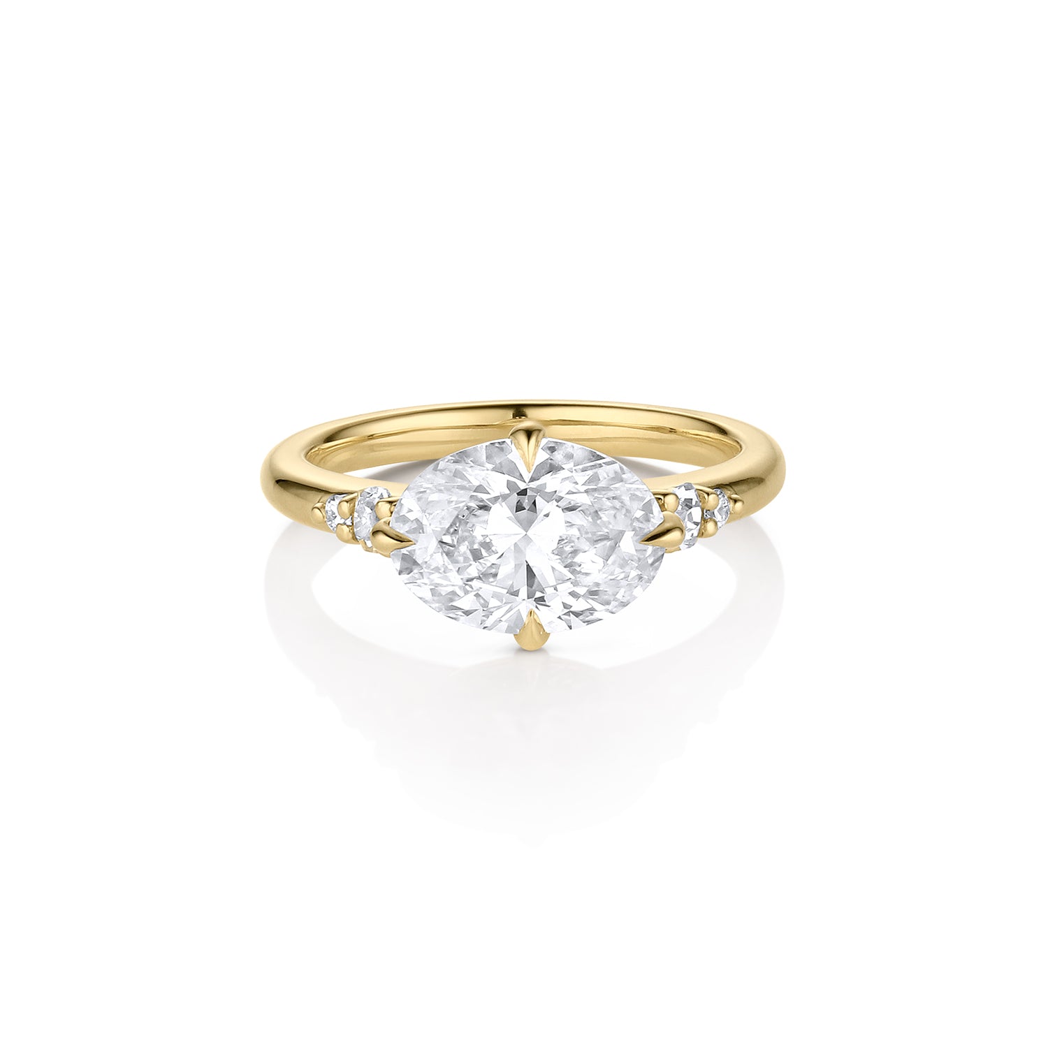 Five stone large oval sideways set white diamond with round accents either side 14k gold engagement ring on white background