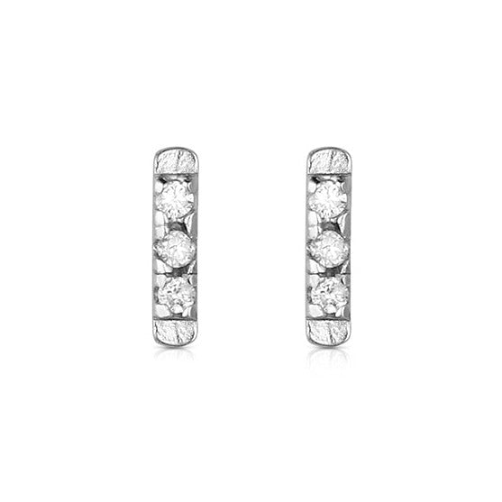 Pair of 14k white gold post bar earrings with white diamonds on white background
