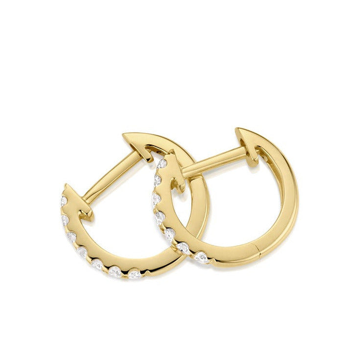 14k gold hinged hoop earrings with small white diamonds side view on a white background