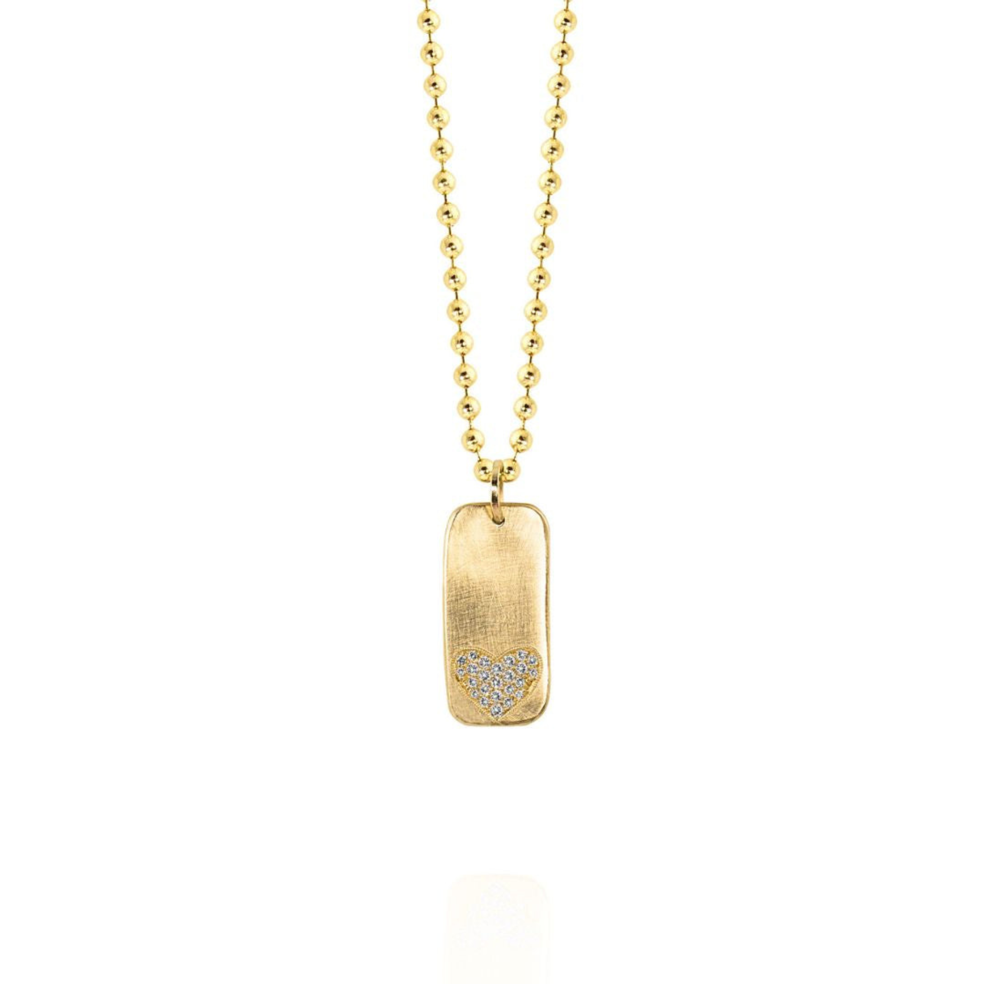 14k yellow gold rectangle pendant with paved set white diamond heart on ball chain on a white background