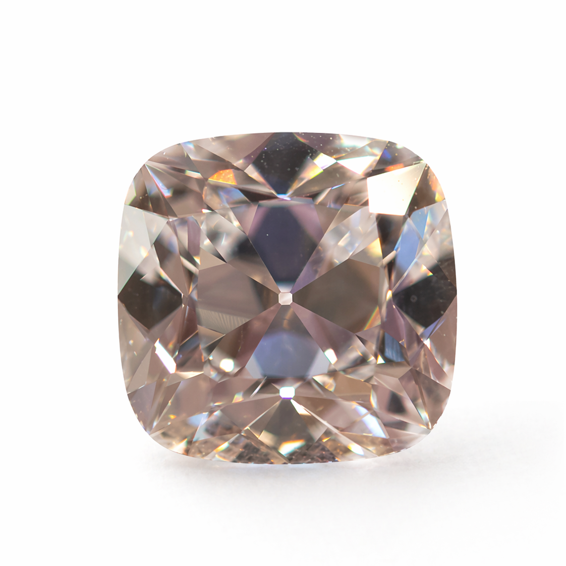 Picture of a loose old mine cut diamond on a white background