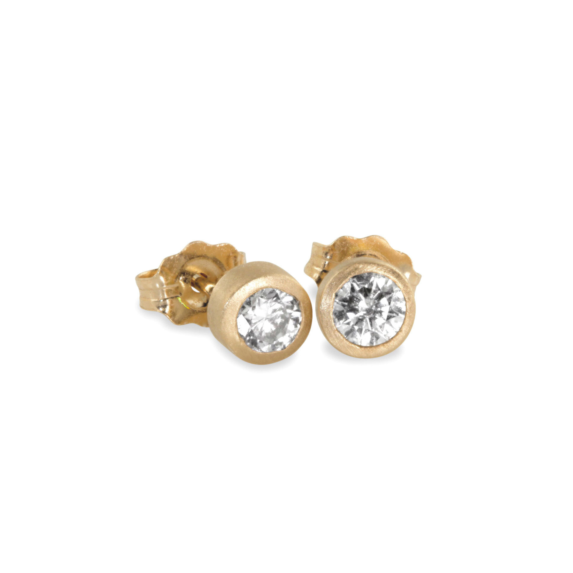 14k yellow gold round bezel set white diamond stud earrings on white background