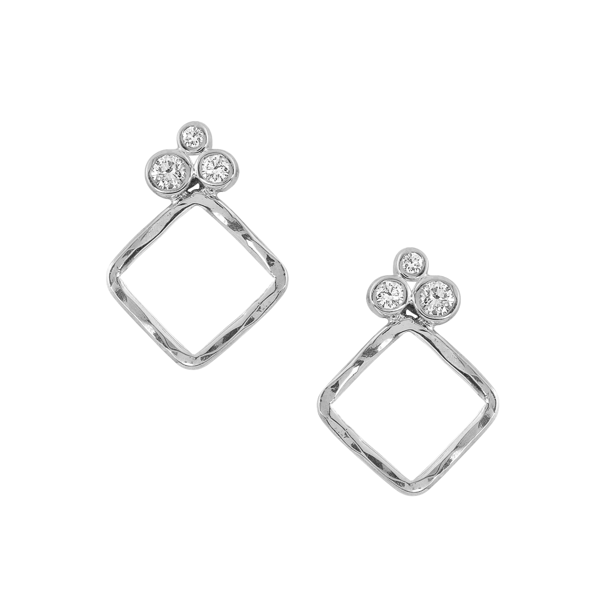 14k white gold diamond trio with diamond shaped gold drop earrings on white background