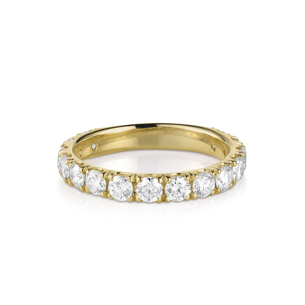 14k gold wide band eternity ring with embedded prong set round white diamonds smooth rounded interior on a white background