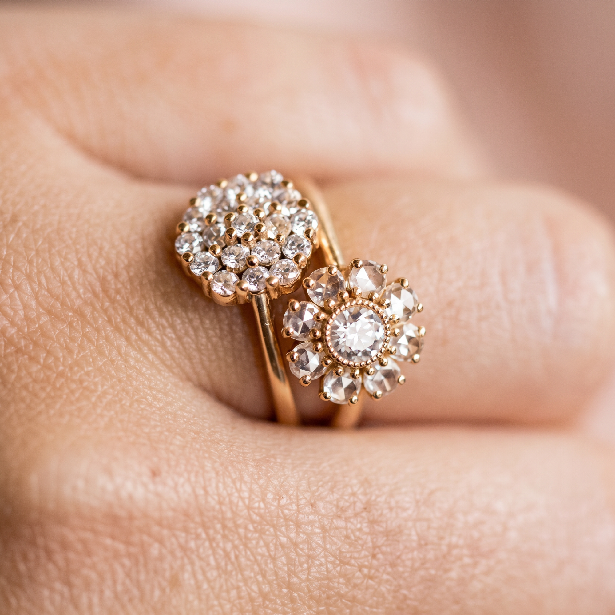 Rose cut diamond cluster engagement rings in 14k gold, lifestyle shot worn on a model's hand