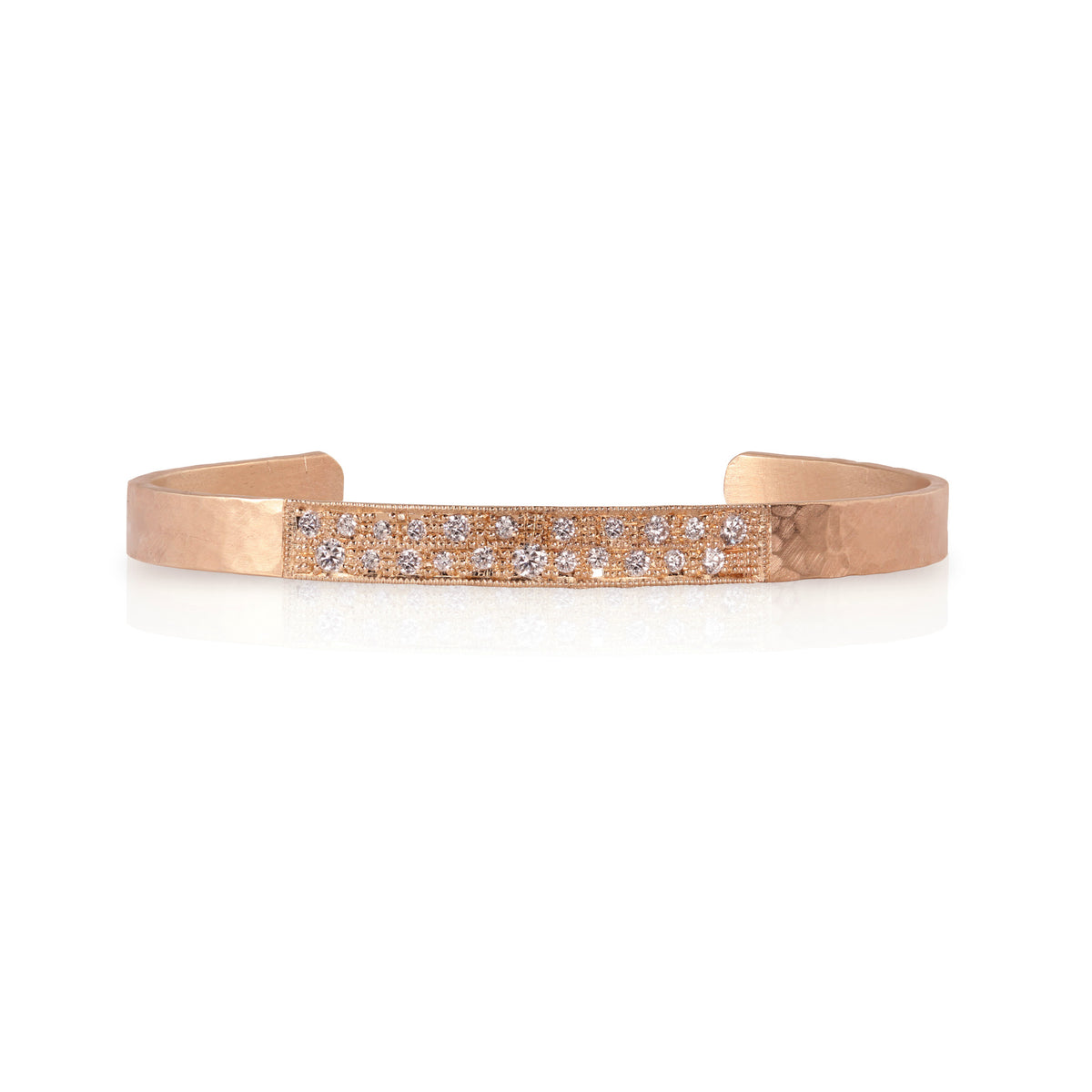 14k Rose Gold cuff bracelet hand hammered textured with embedded diamonds shown on a white background.