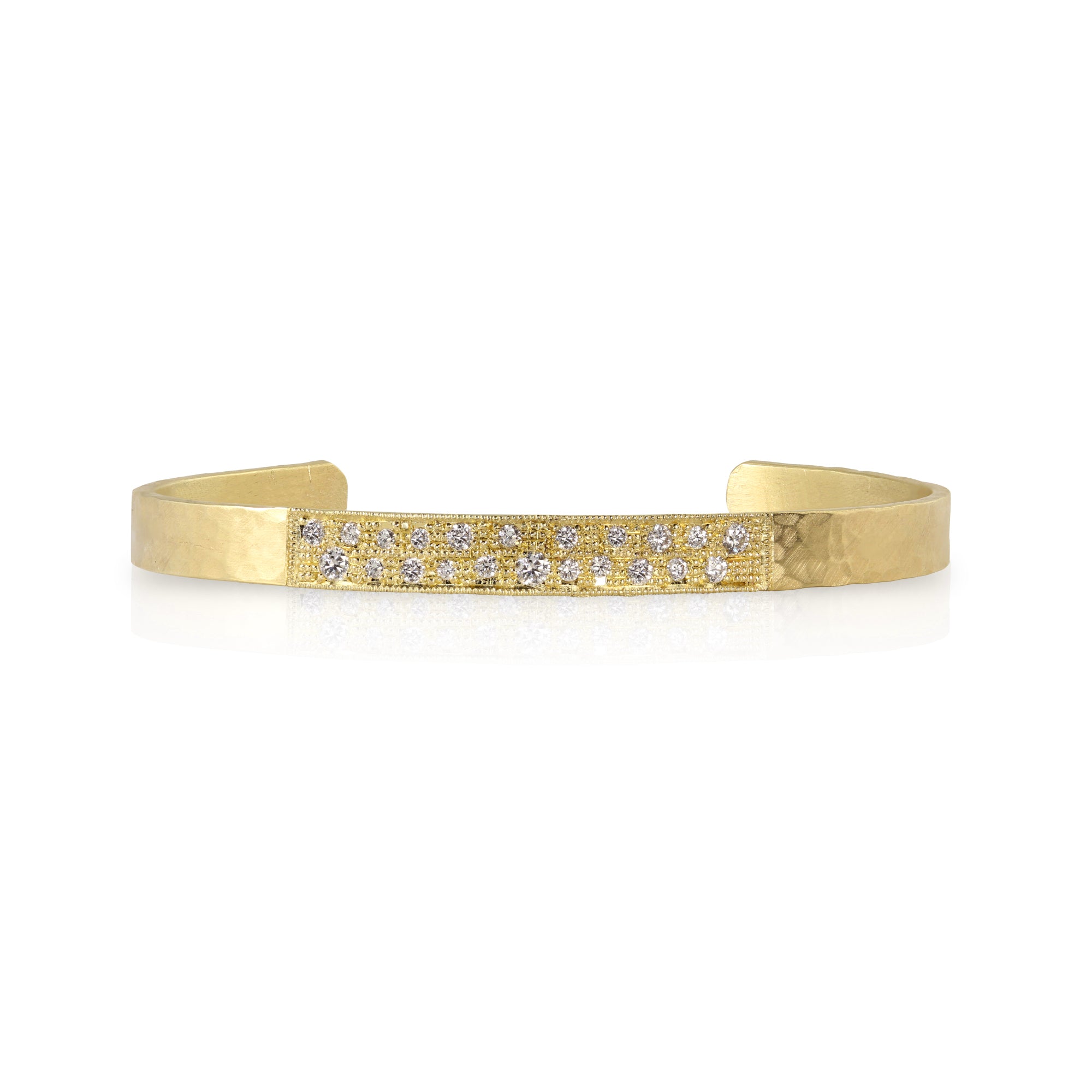 14k Gold cuff bracelet hand hammered textured with embedded diamonds shown on a white background.