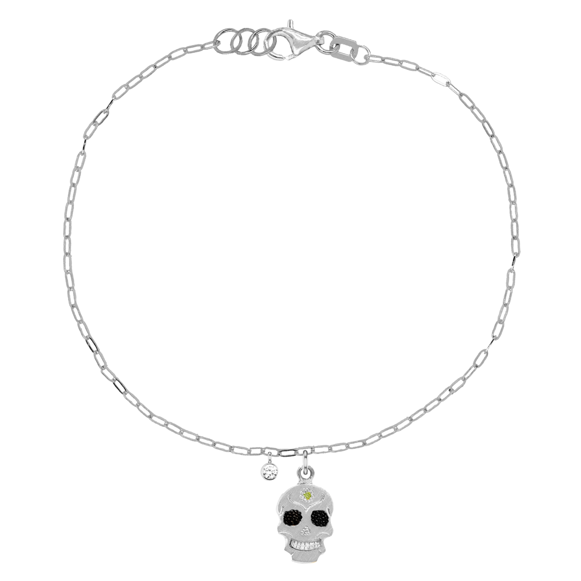 14k white gold teeny tiny ghostrider skull charm bracelet with colored gemstone and hand etching on paperclip link chain with white diamond bezi charm on white background