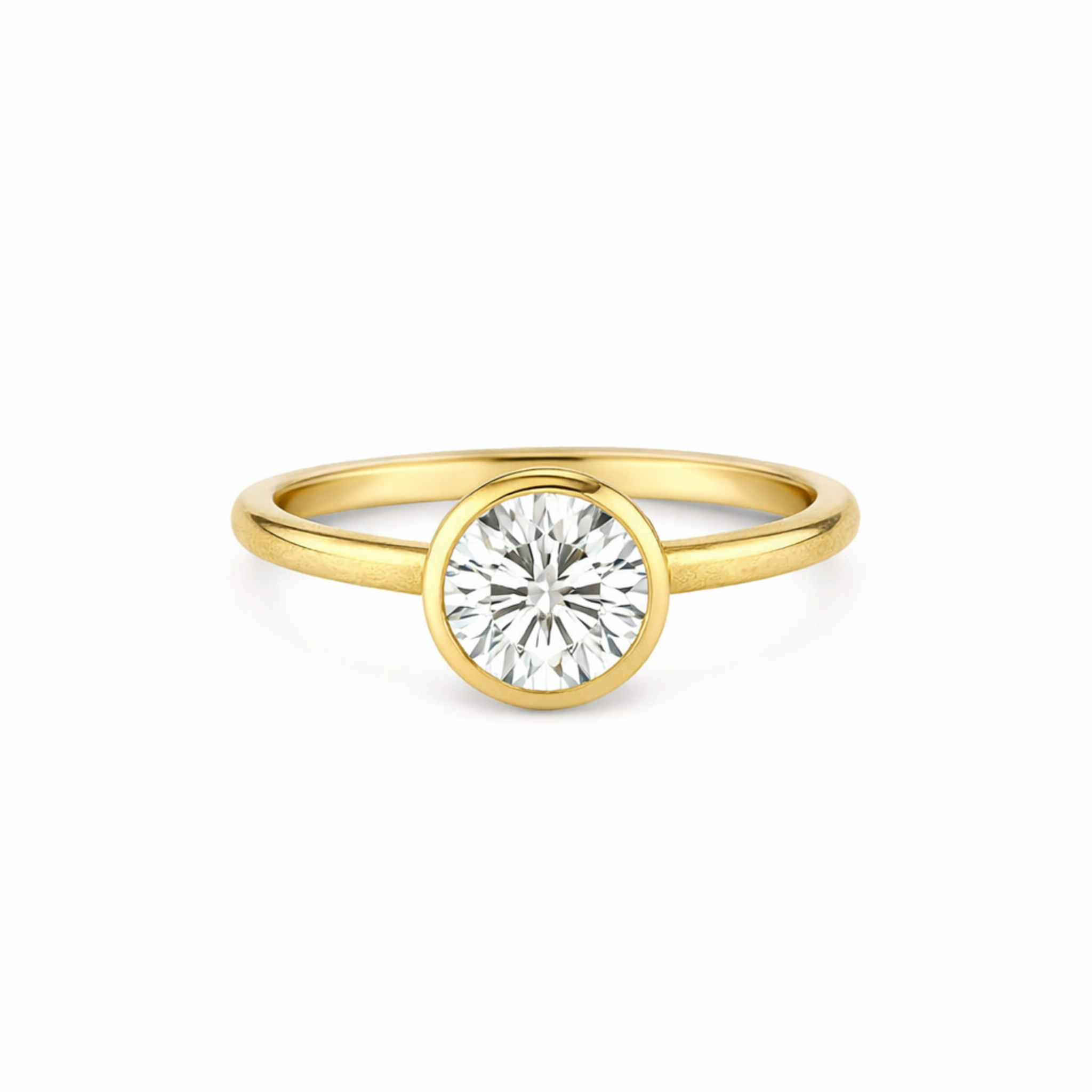 Yellow gold bezel set solitaire ring with a round white diamond tapered band with high polish shown side view on a white background