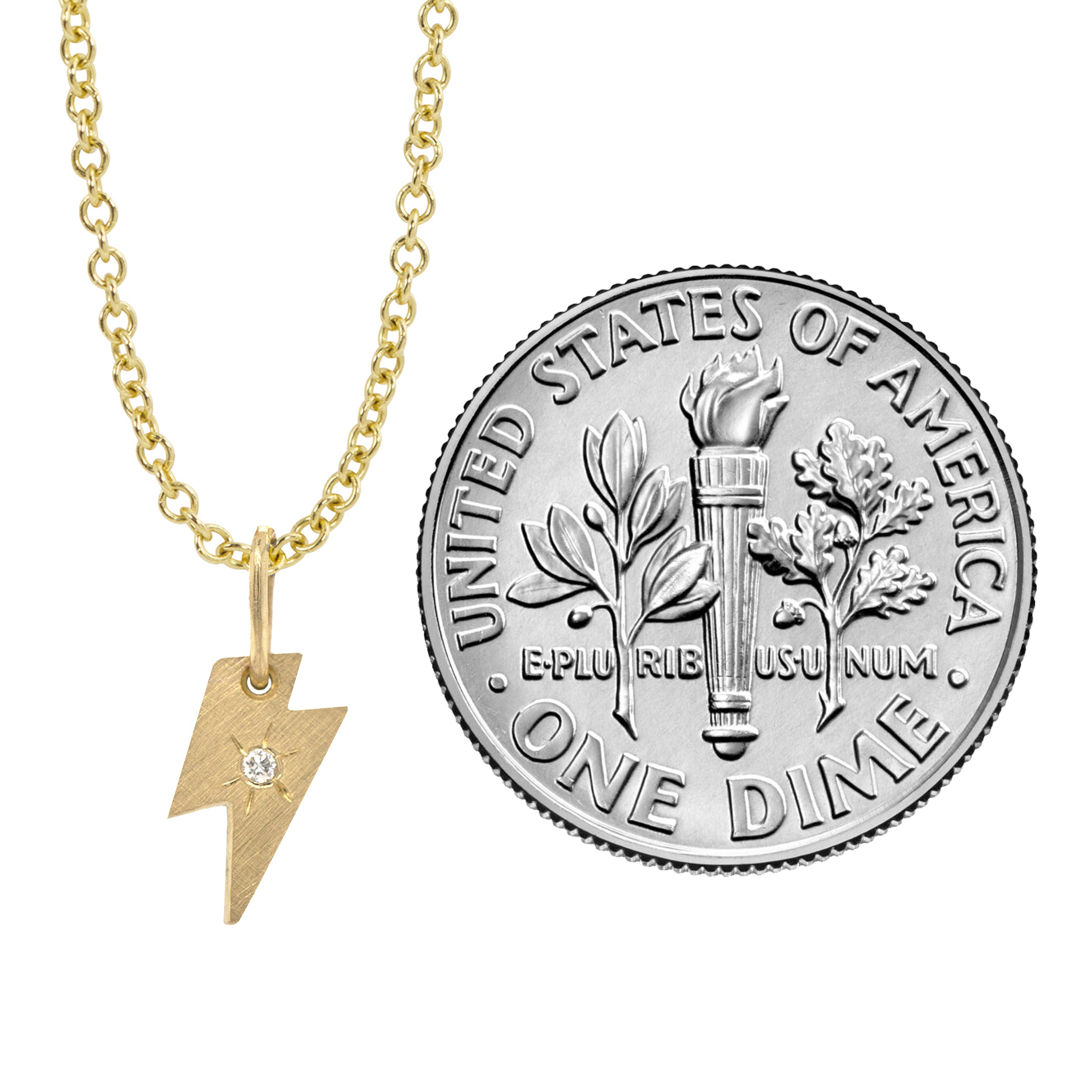 14k yellow gold lightning bolt pendant with white diamond and hand etched starburst on a white background with size indicator