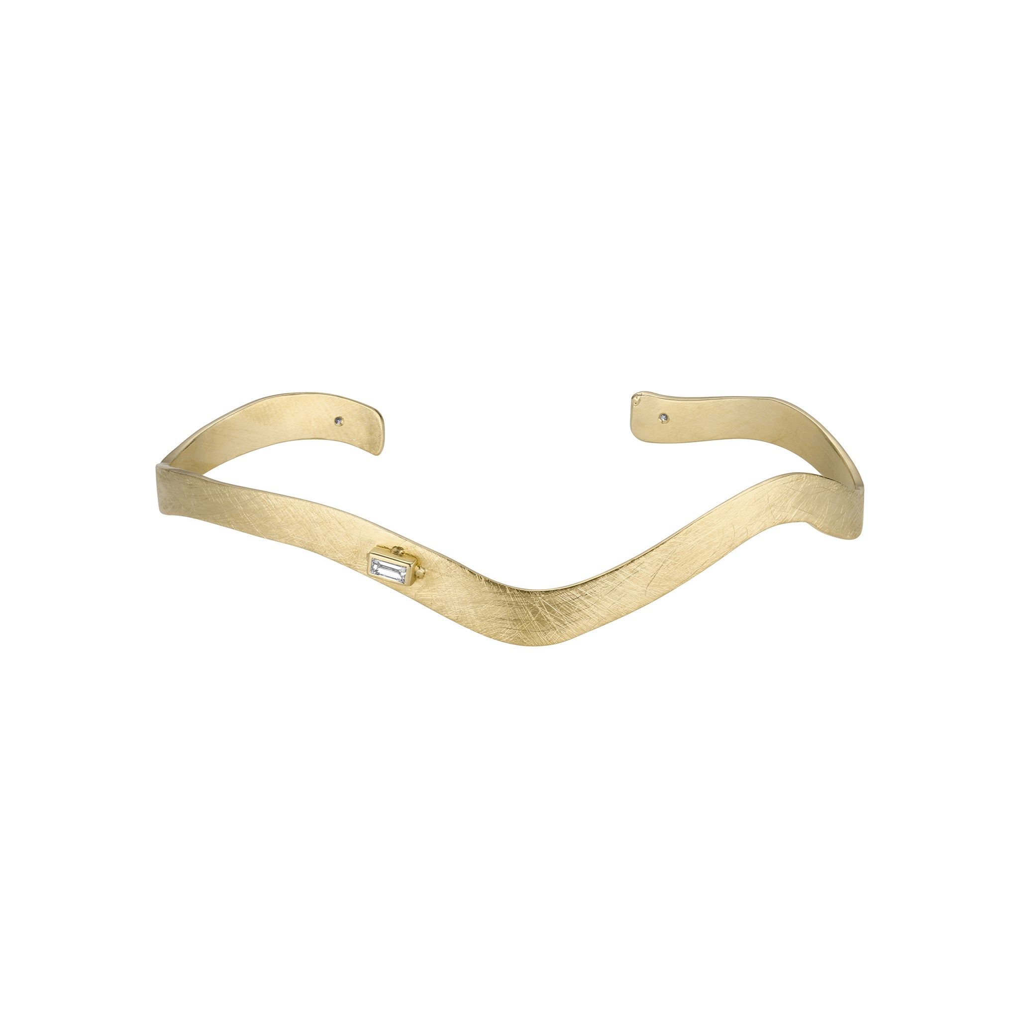 Wave cuff bracelet in solid 14k gold with off set diamond detail