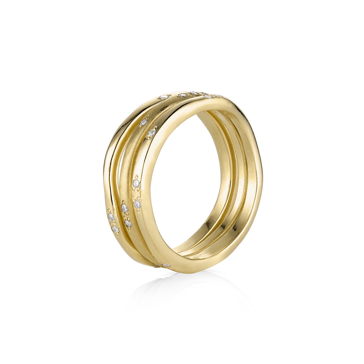 Stack of three 14k gold wavy rings with embedded diamonds. polished and satin texture shown side view on a white background