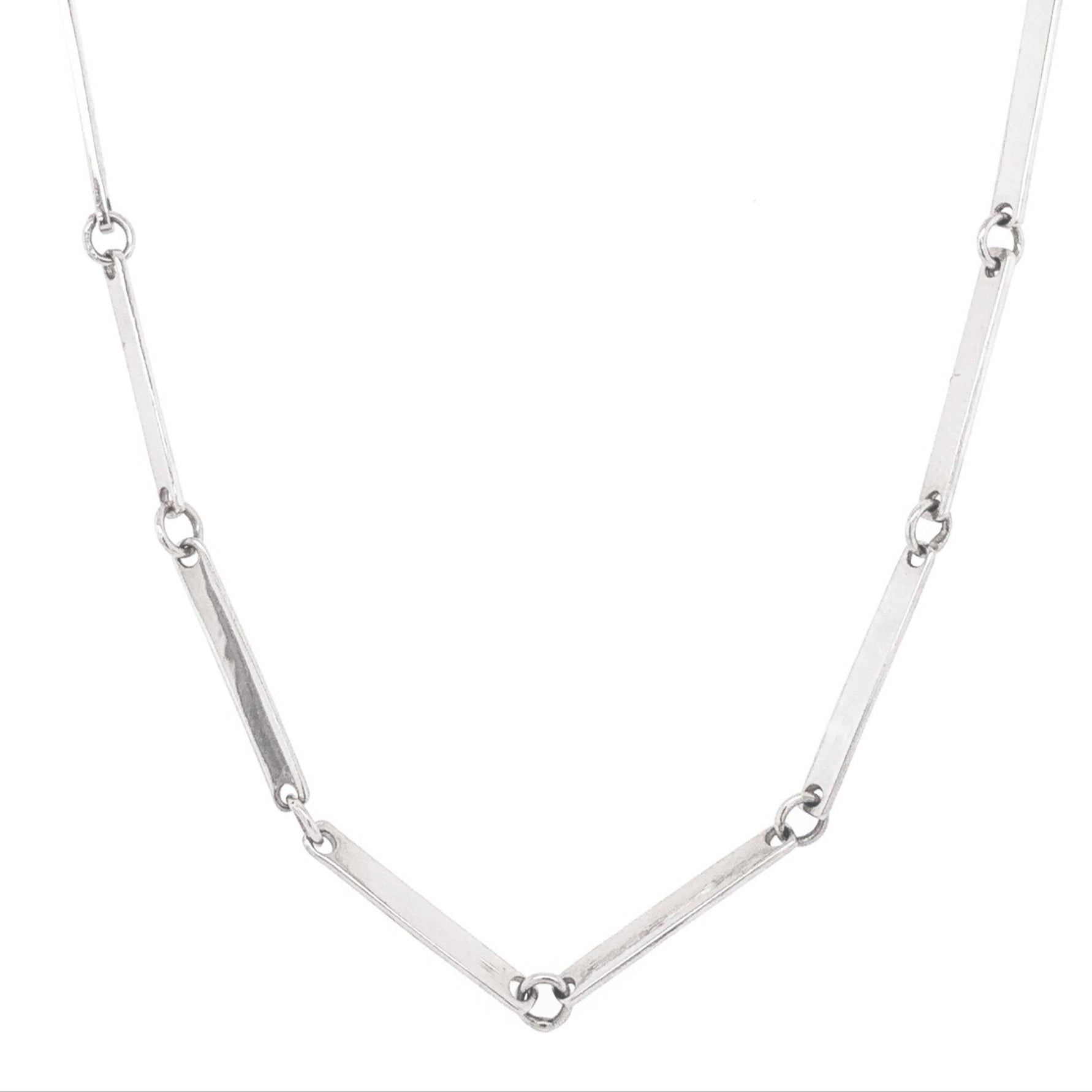 Handmade 14k Gold Chain in white gold bar link design. Shown on white background.